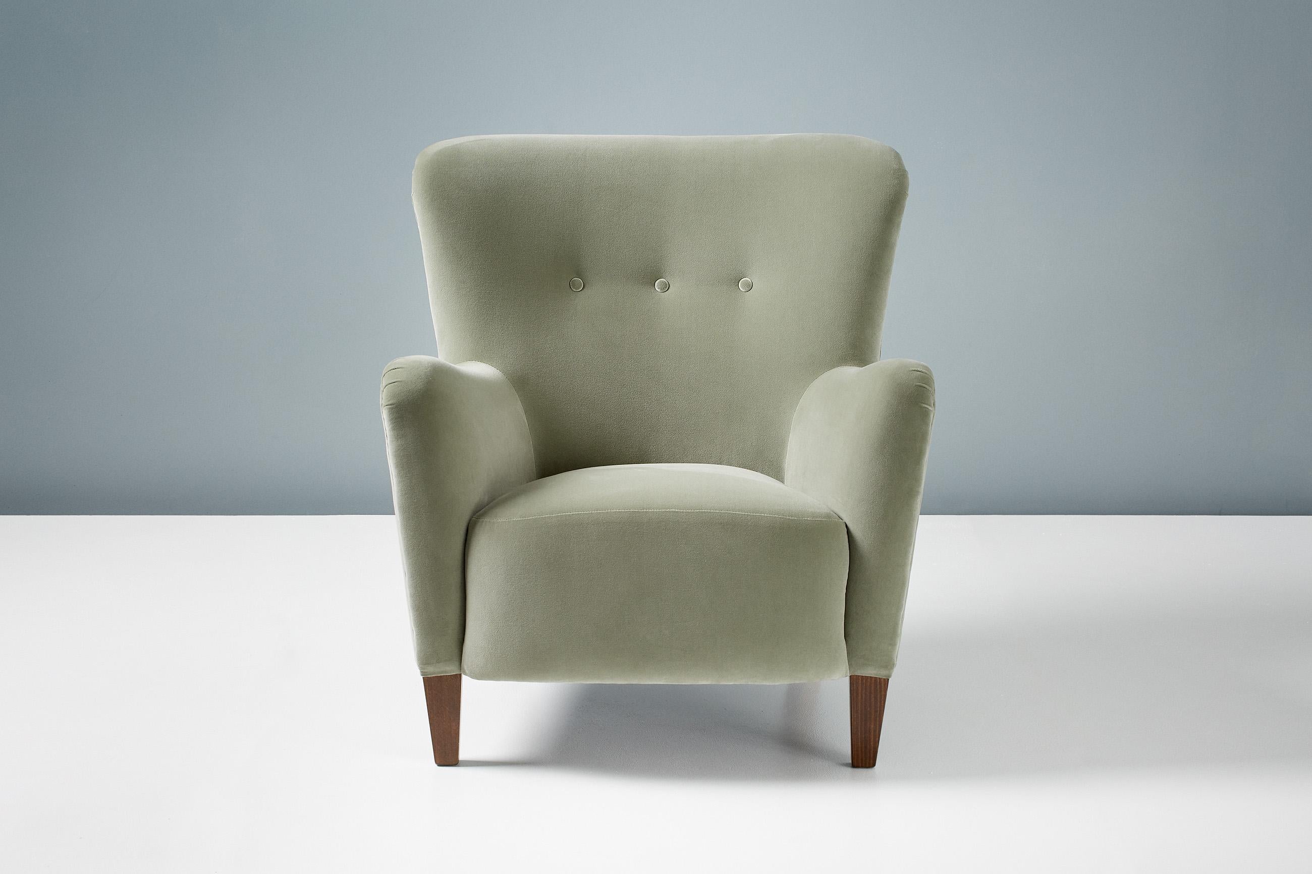 Dagmar design

RYO armchair

custom made lounge chair developed and produced at our workshops in London using the highest quality materials. This example is upholstered in luxurious cotton velvet and feature stained beach legs. The RYO chair is