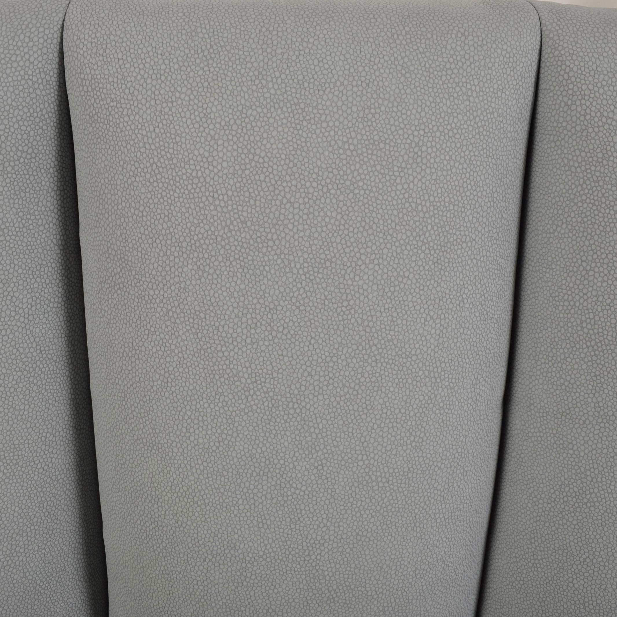 Well made banquette as a nice break from the all dining chair solution. Wrapped in a family friendly textured faux ostrich skin naugahyde.