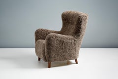 Custom Made Sheepskin Wing Chair & Stool by Dagnmar