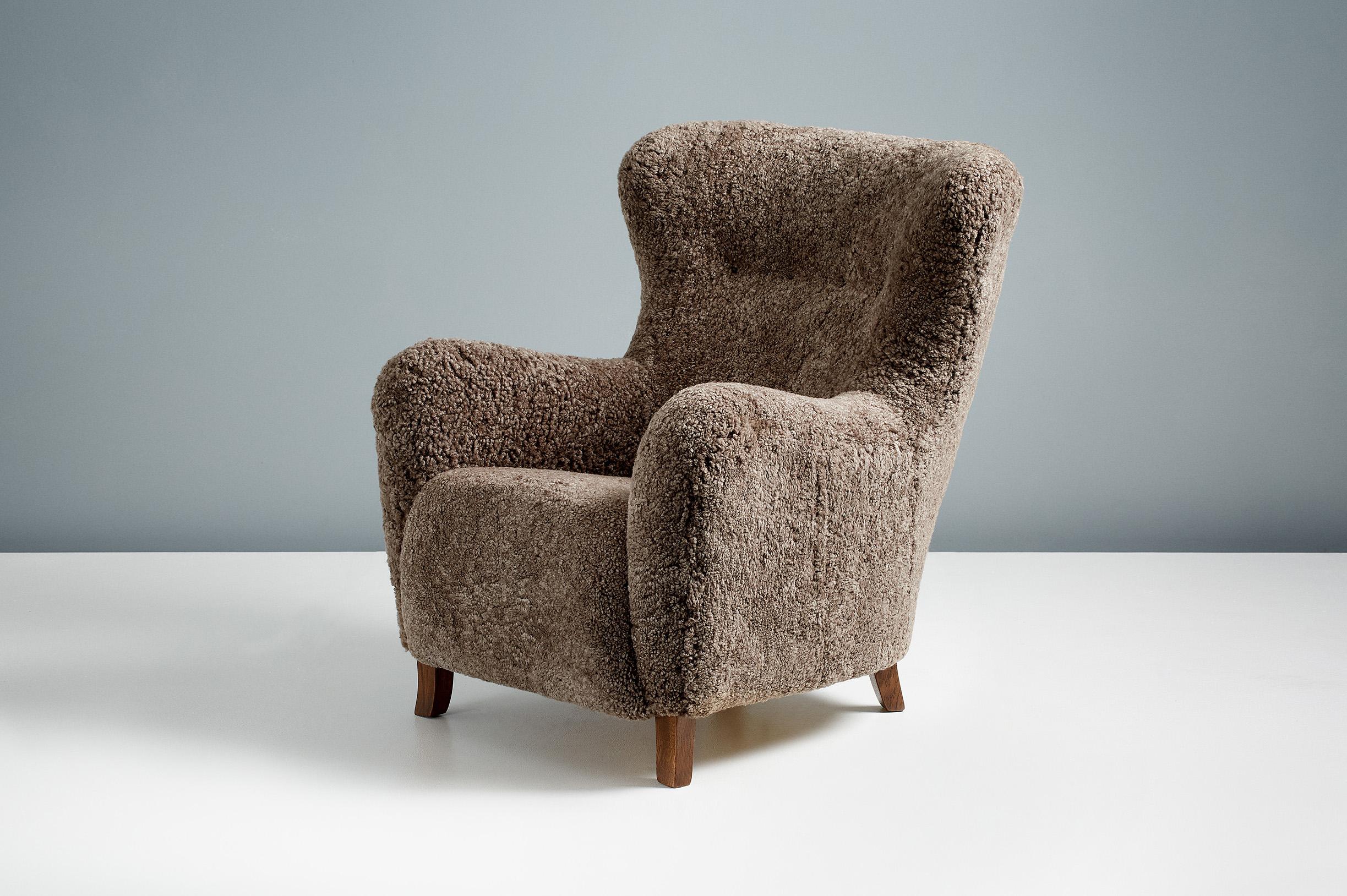 Other Custom Made Sheepskin Wing Chair & Stool by Dagnmar For Sale