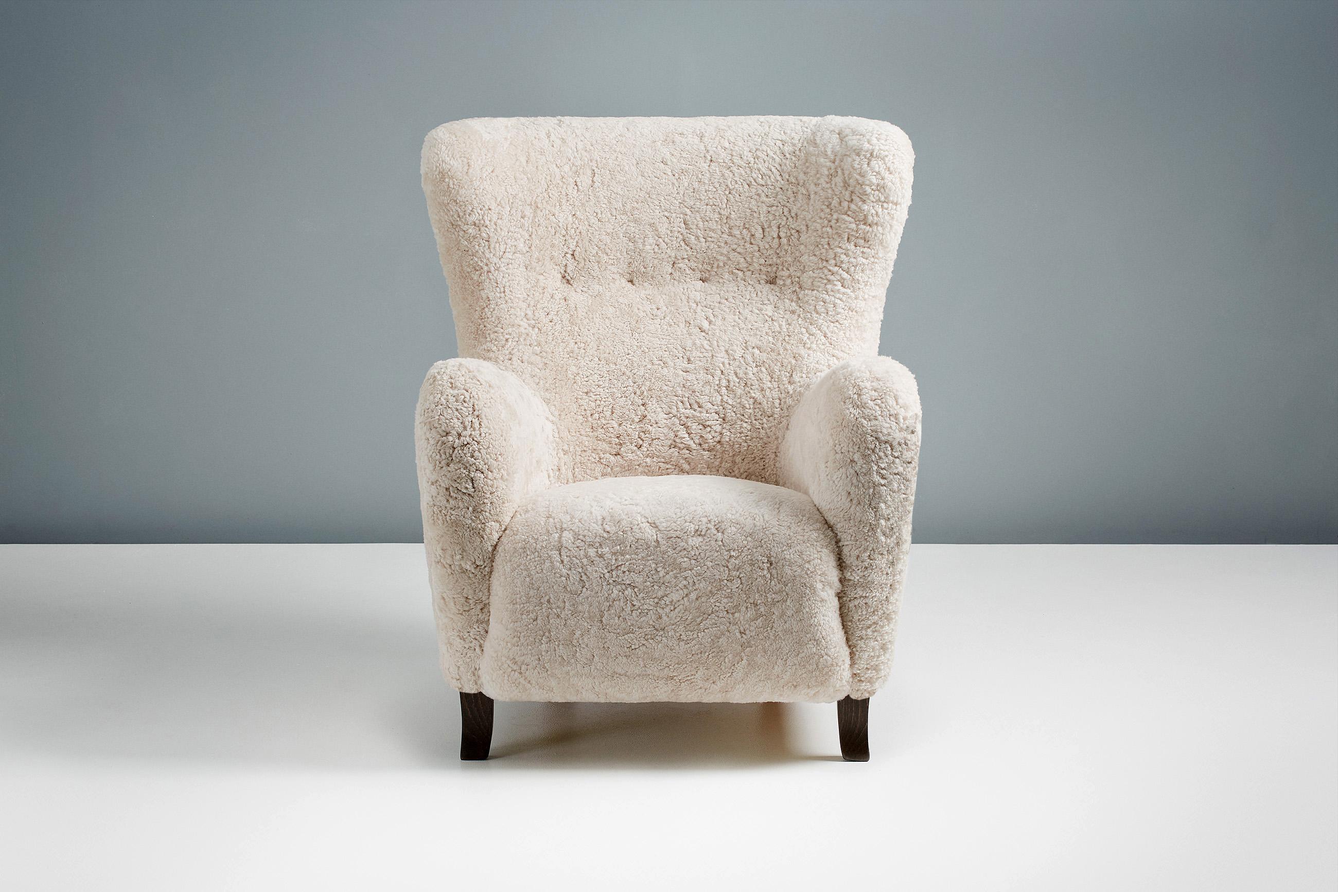 Other Custom Made Sheepskin Wing Chair & Stool by Dagmar For Sale