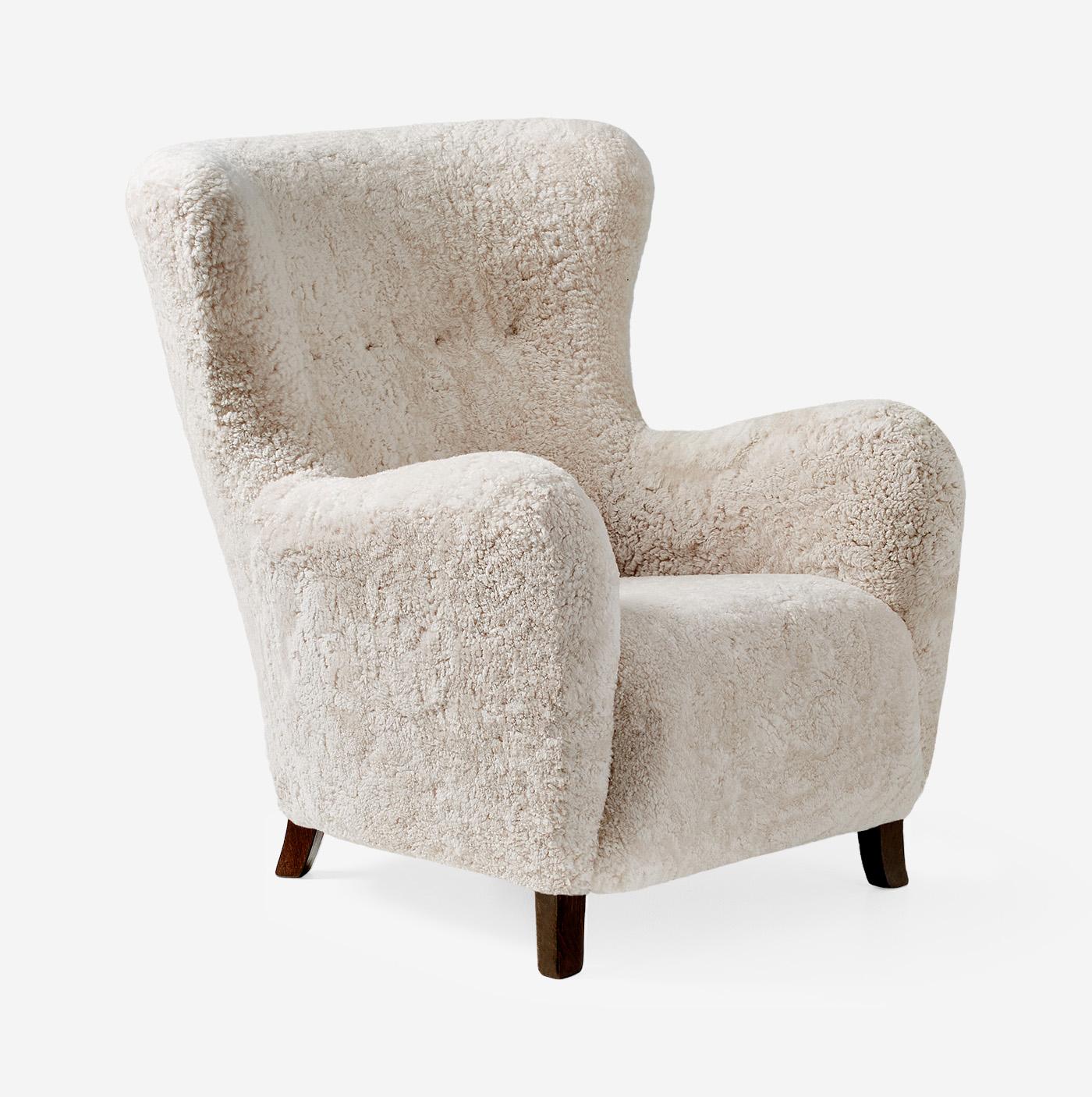 Contemporary Custom Made Sheepskin Wing Chair & Stool by Dagmar For Sale