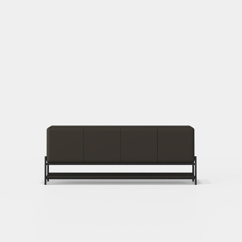 Smooth, curved, and distinctly contemporary, this capsule-shaped sideboard features a softly rounded silhouette that brings a sense of quiet sophistication to any interior. The body is finished in a warm matte lacquer, offering a velvety surface