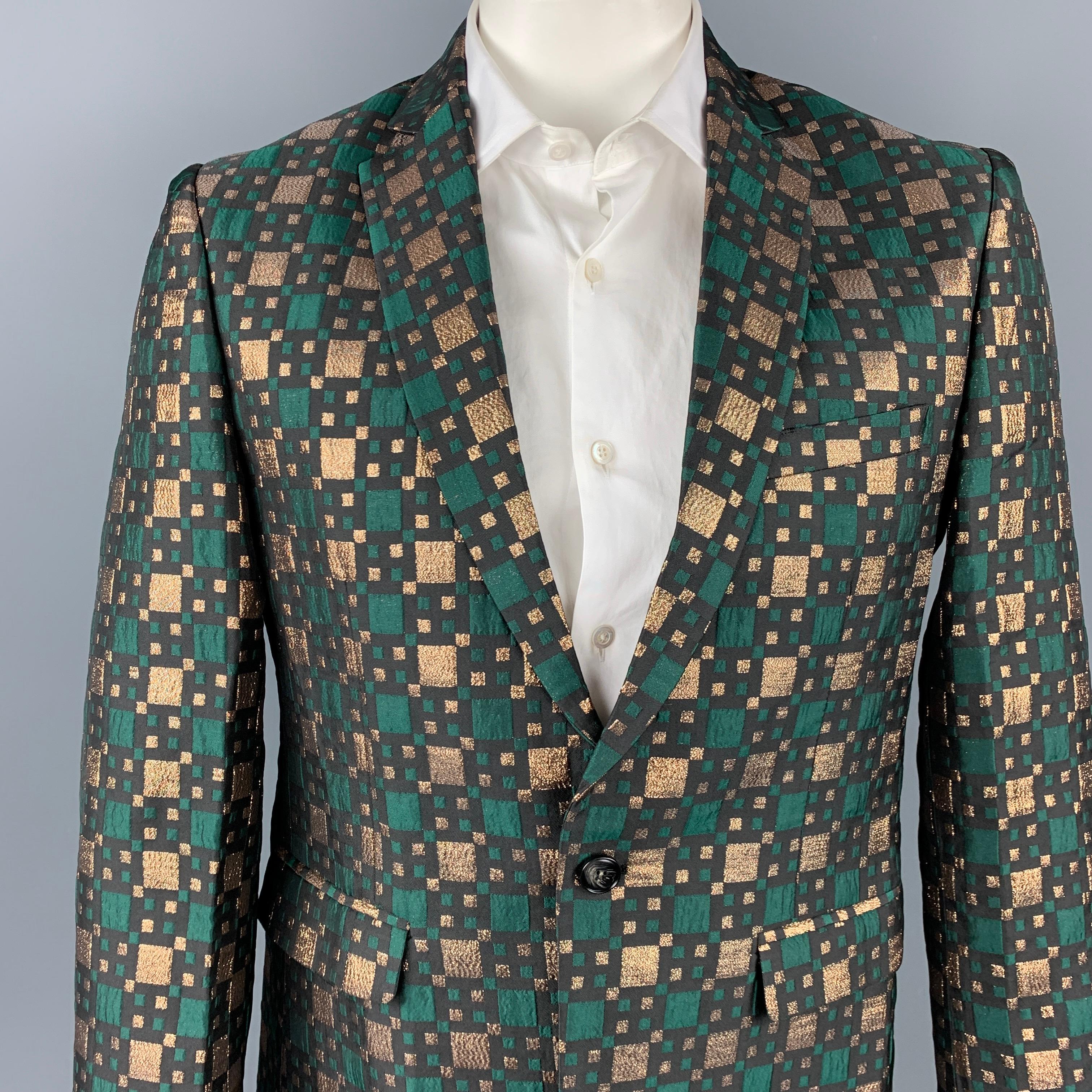CUSTOM MADE sport coat comes in a green & gold jacquard material featuring a notch lapel, flap pockets, and a single button closure. 

Very Good Pre-Owned Condition.
Marked: No size marked

Measurements:

Shoulder: 18. in.
Chest: 42 in.
Sleeve: 26