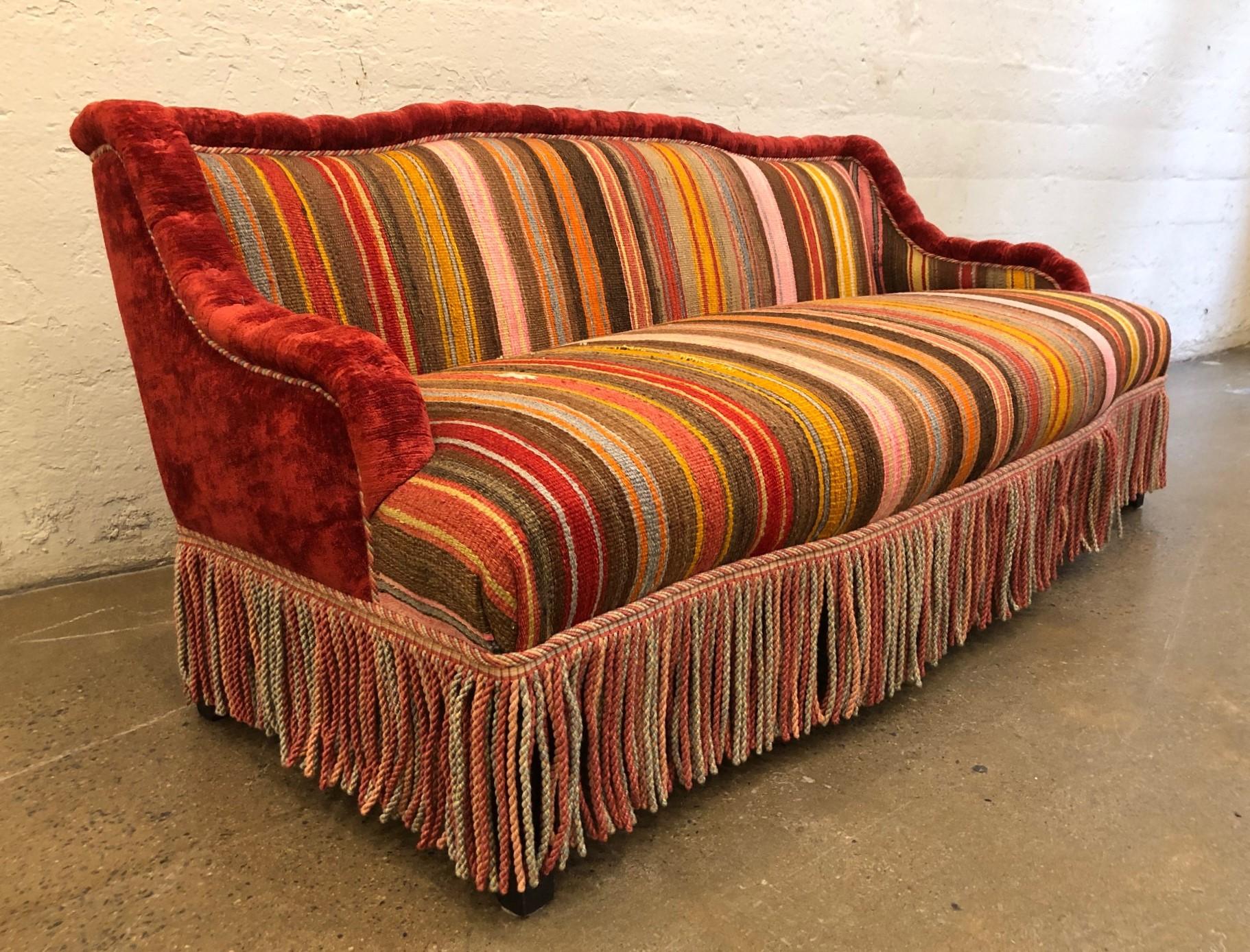 Custom made sofa in vintage flat-woven Kilim. The back is mohair as well as the trim of the sofa. The sofa has wooden legs.