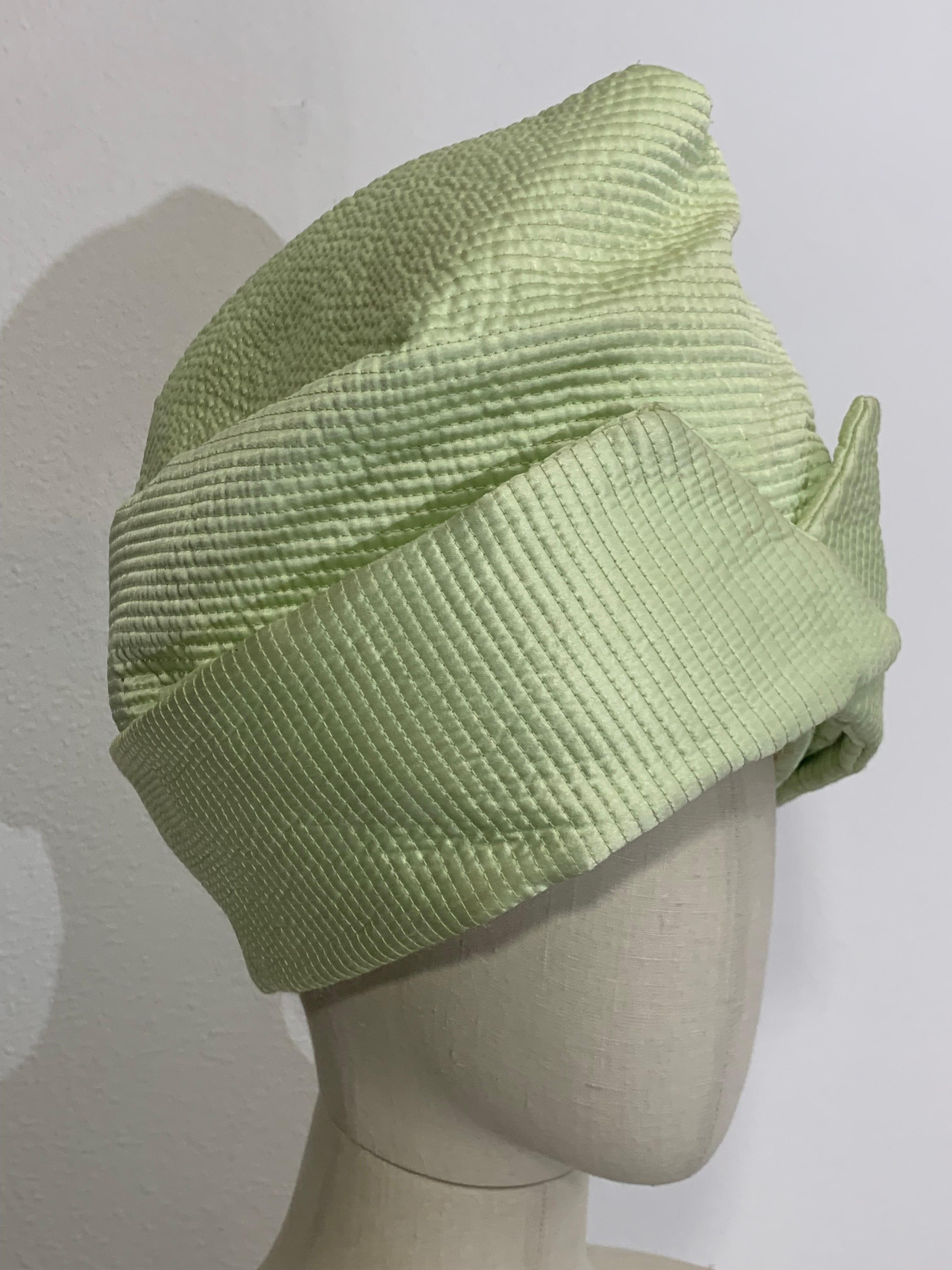 Custom Made Suzanne Couture Millinery NY Spring/Summer Celadon Quilted Silk Toque / Turban:  Folded, slightly padded, peaked at top. Organza lining. US size 7 1/8. 

Please visit our 1Dibs Store for many more options from this same collection which