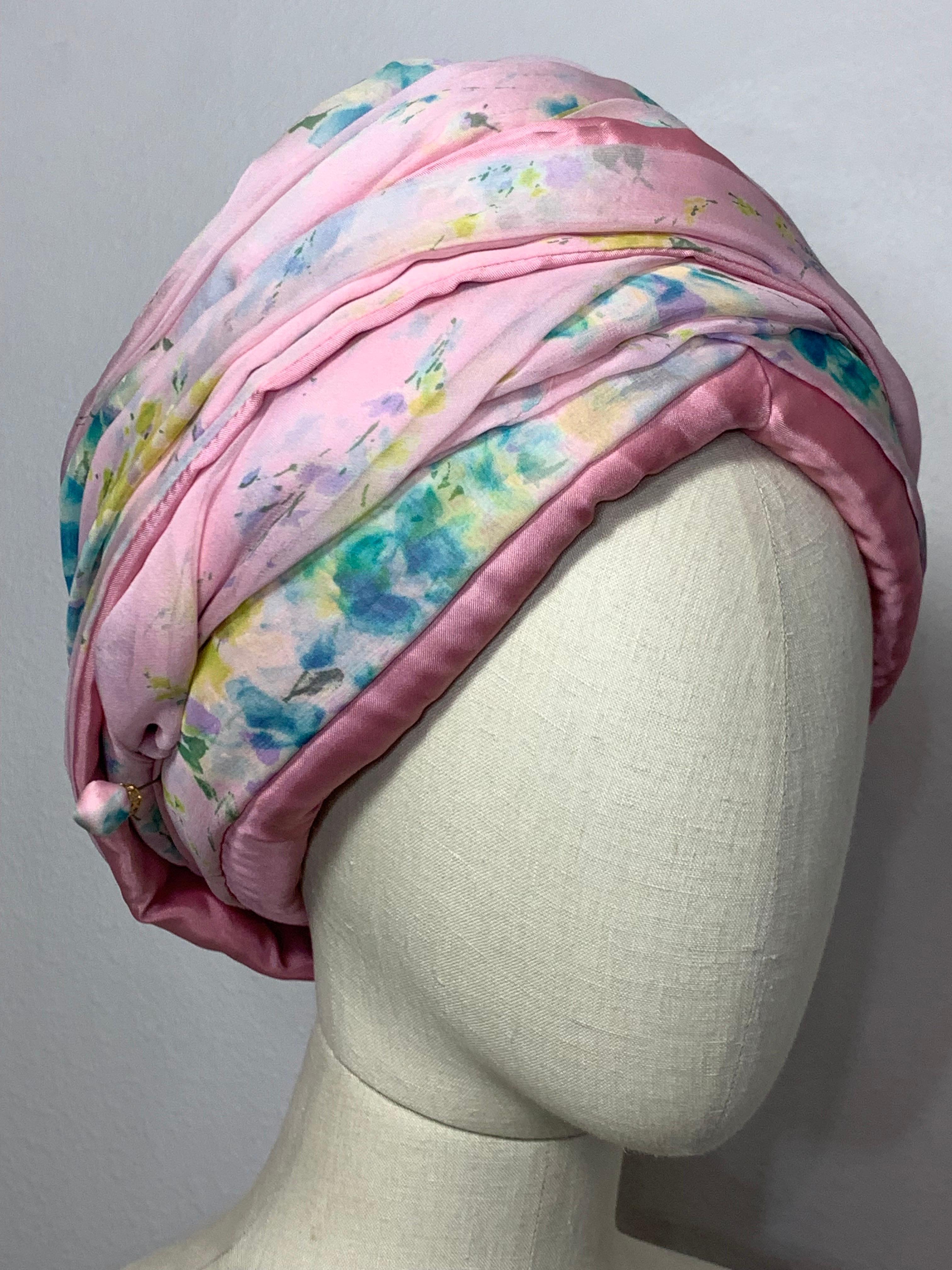 Custom Made Spring/Summer Pastel Pink Chiffon Turban w Delicate Floral Print: A very traditional shape turban, simple and spare with elaborate wrapped pattern but no extra embellishment. A soft watercolor floral design. Matching hatpin included.
