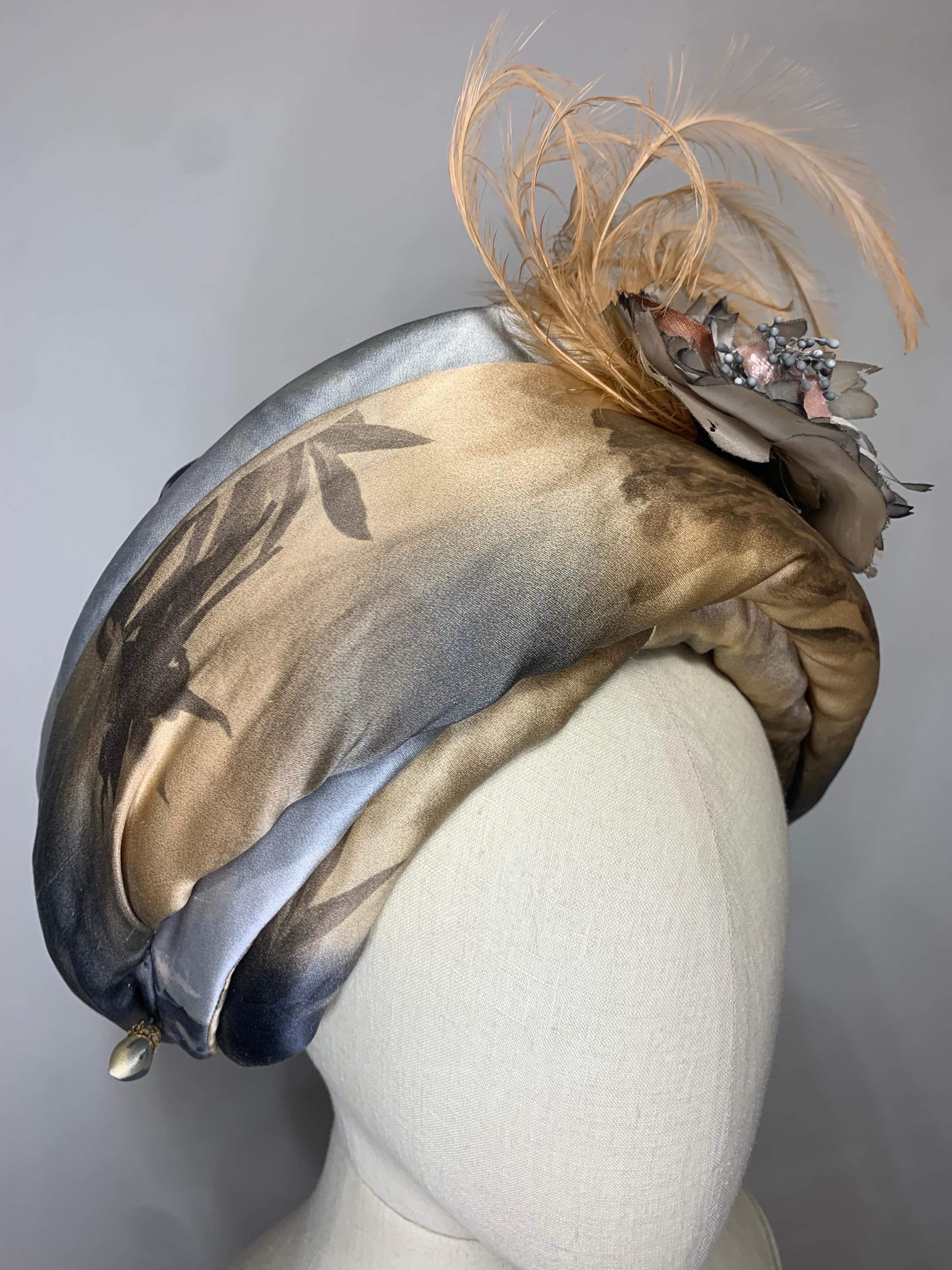 Custom Made Taupe & Gray Ombre Floral Print Silk Turban w Feather & Flower at Front Center:  An unusual floral print padded turban in a neutral palette make this stunning turban very wearable. Beautiful soft peach feather embellishment. US size 7