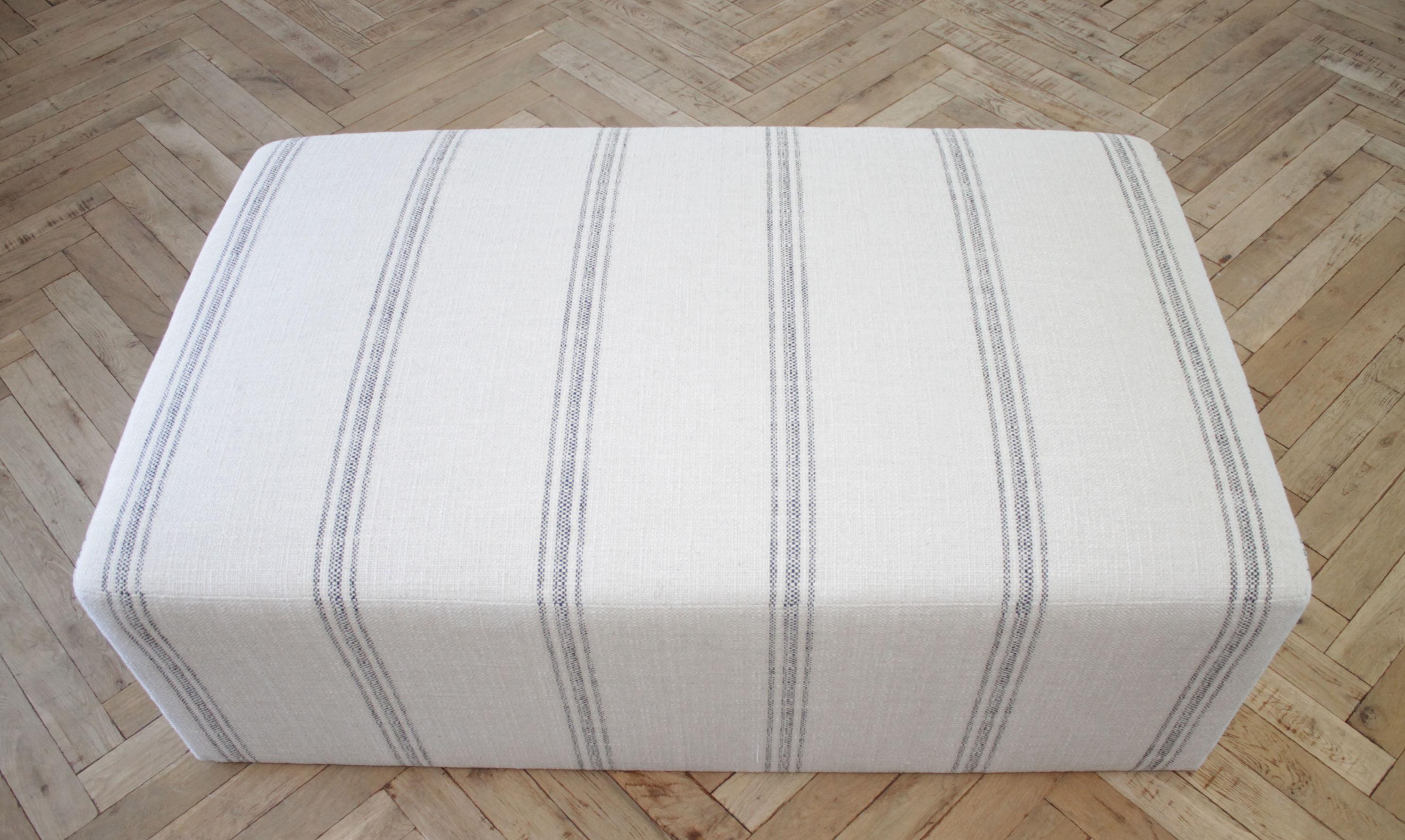 striped upholstered ottoman