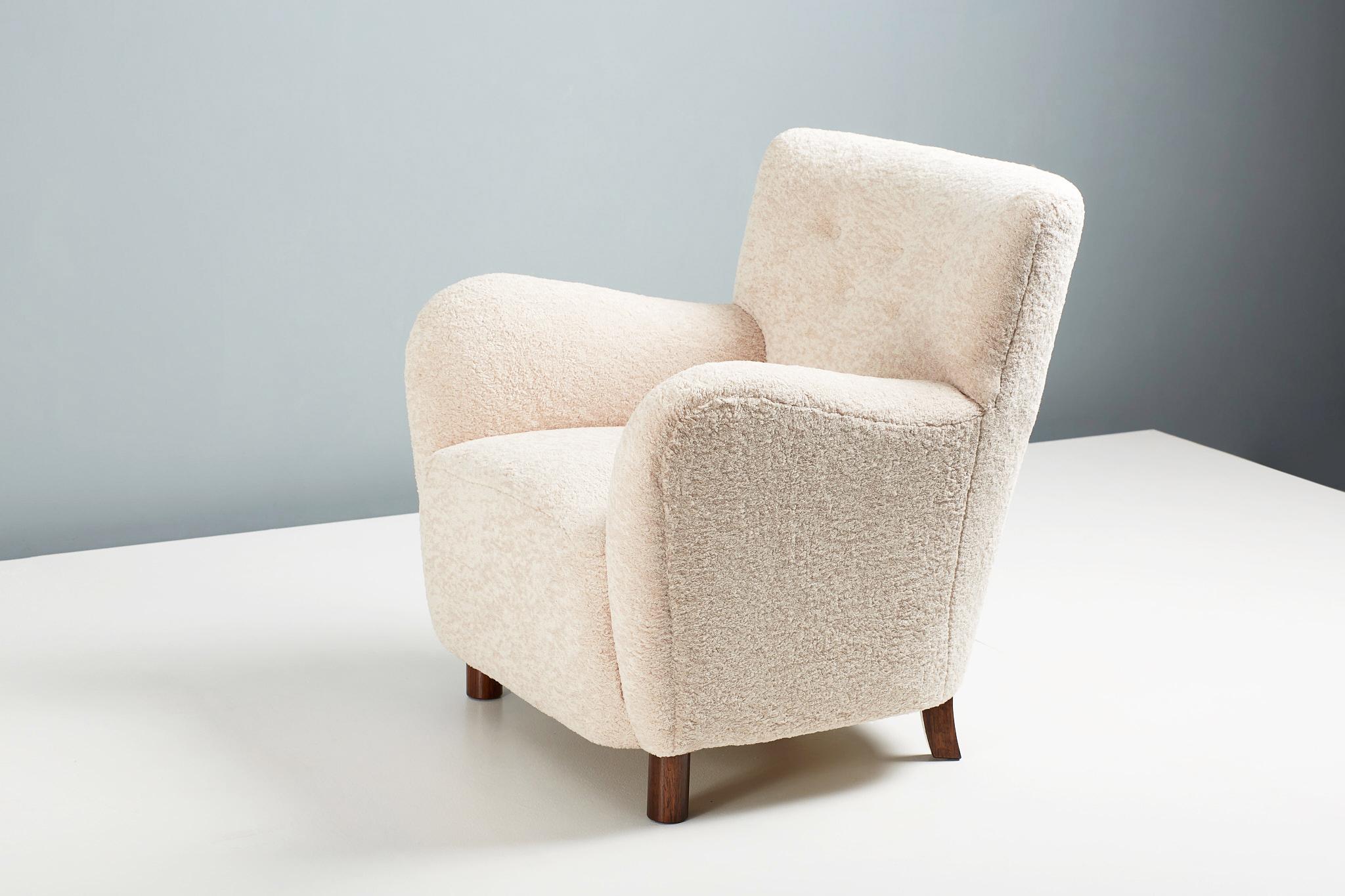 Dagmar design - model 54 lounge chair.

A custom made lounge chair developed and hand-made at our workshops in London using the highest quality materials. The 54 chair is available to order in a range of different shearling colors and fabrics with