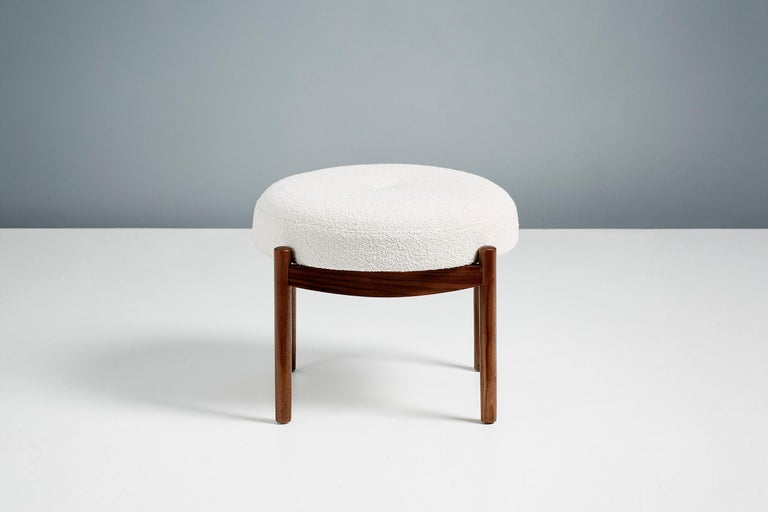 Dagmar design

Blek ottoman

A custom-made round ottoman with solid wood frame developed & produced at our workshops in London. These examples have frames in fumed and oiled oak with seats upholstered in off-white boucle. Blek is available to