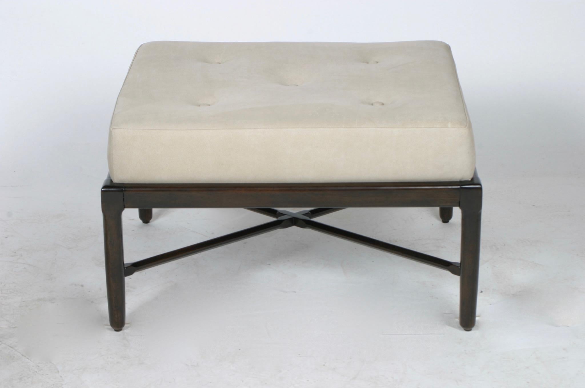 Reproduced from an original 1950s design, in the style of vintage Tomlinson Sophisticate line. Custom made bench or ottoman with mahogany X-base with button tufting, shown in leather but available C.O.M. Also available in custom sizes. Allow 5-6