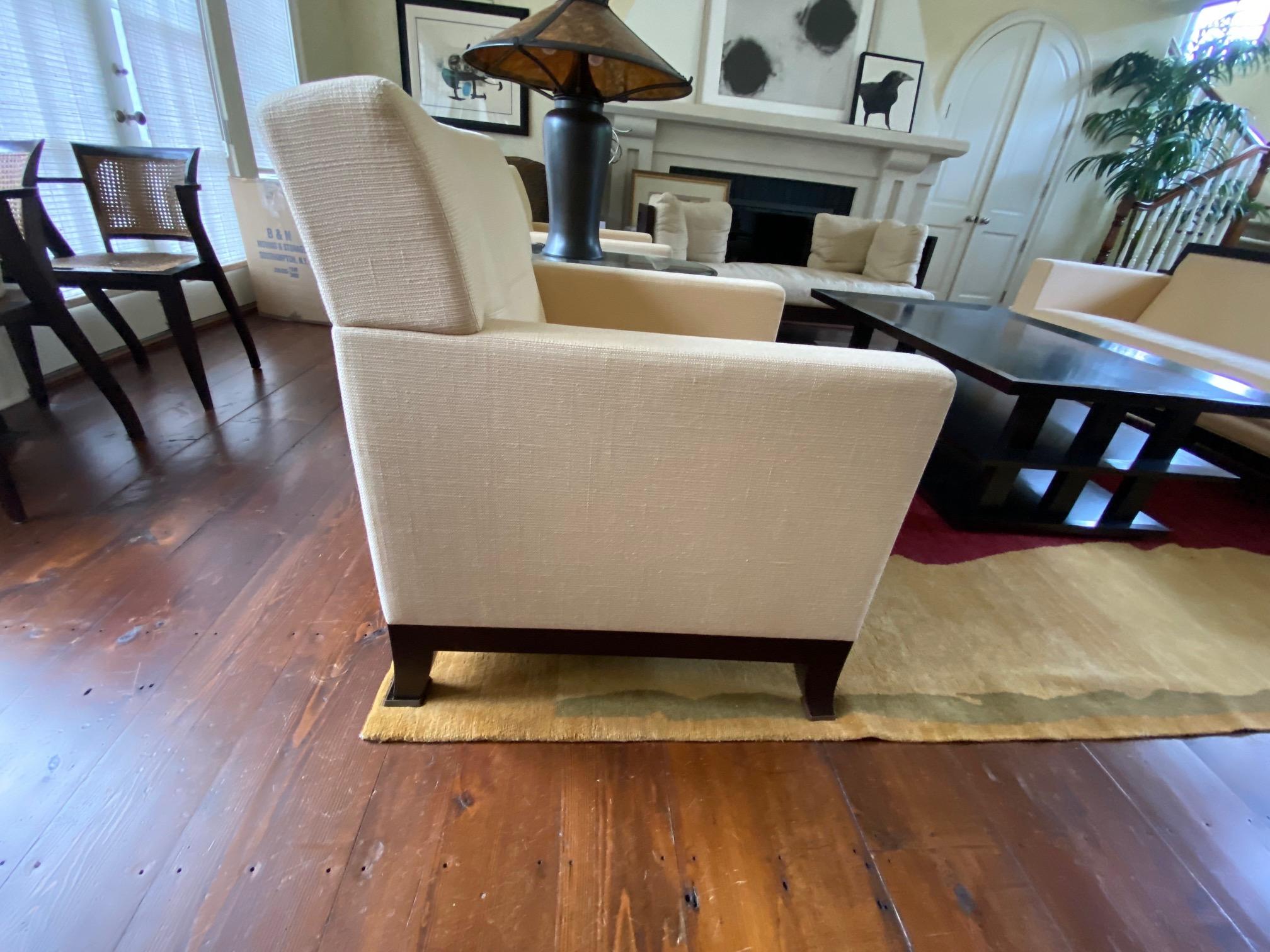 Custom mahogany han club chair by Jiun Ho
This custom club chair was originally specified by Clodagh Design. Clean, refined lines and excellent seaming down the center back making four quadrants. Interesting frame design, boxed arms, slightly