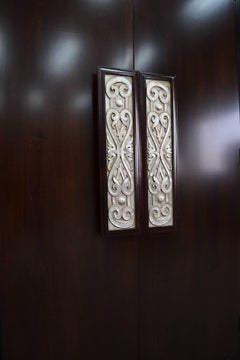 Custom Maple Cabinet with Silver Leaf Door Pulls
