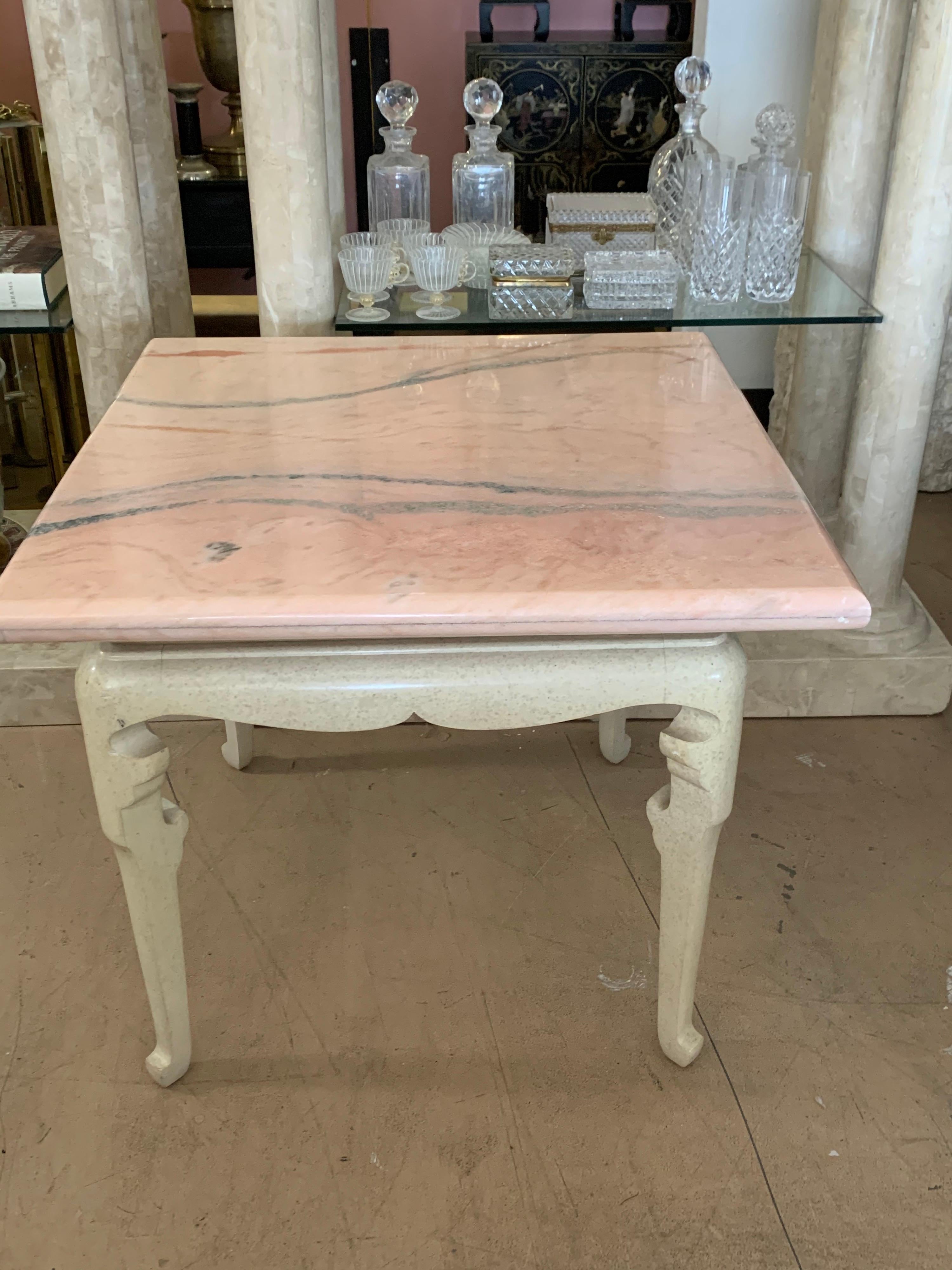 This piece came from the living room of a fashionista’s house in Palm Springs California. The table was made by Marge Carson with custom pink veined marble top added. The colorations are really beautiful. Two color beige base with pink and beige
