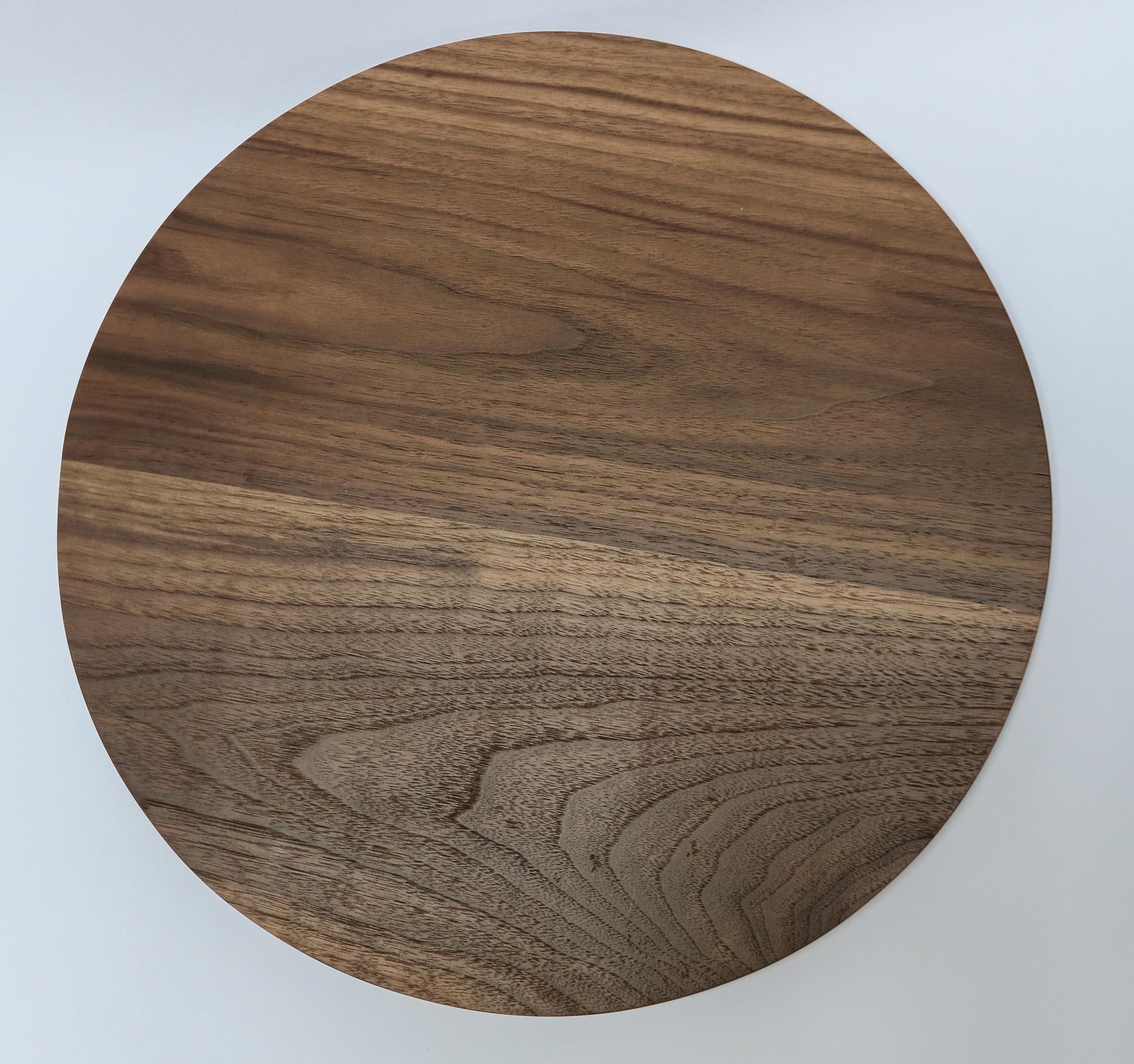 Custom medium round wood serving board in walnut by Adesso Imports. Can be done in different sizes and woods.