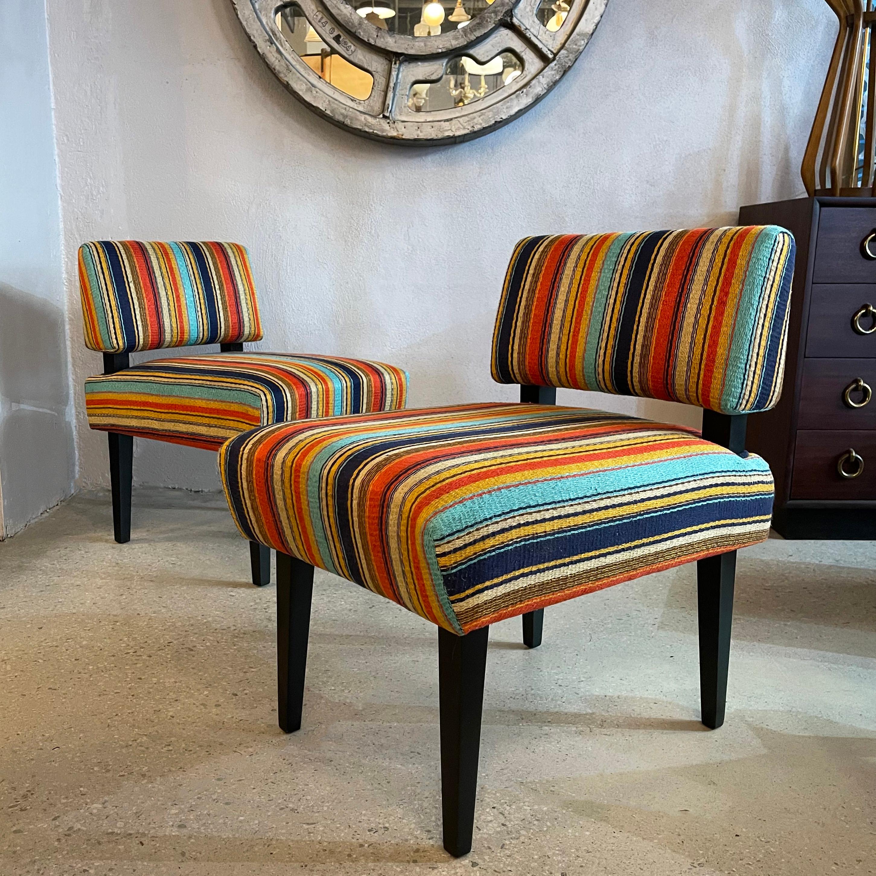 Pair of minimal, low profile, slipper chairs designed and made by cityFoundry in Brooklyn, NY for our cFsignature line of vintage inspired pieces feature lacquered maple frames with fully upholstered seats and backs in vibrant multi-color, uneven
