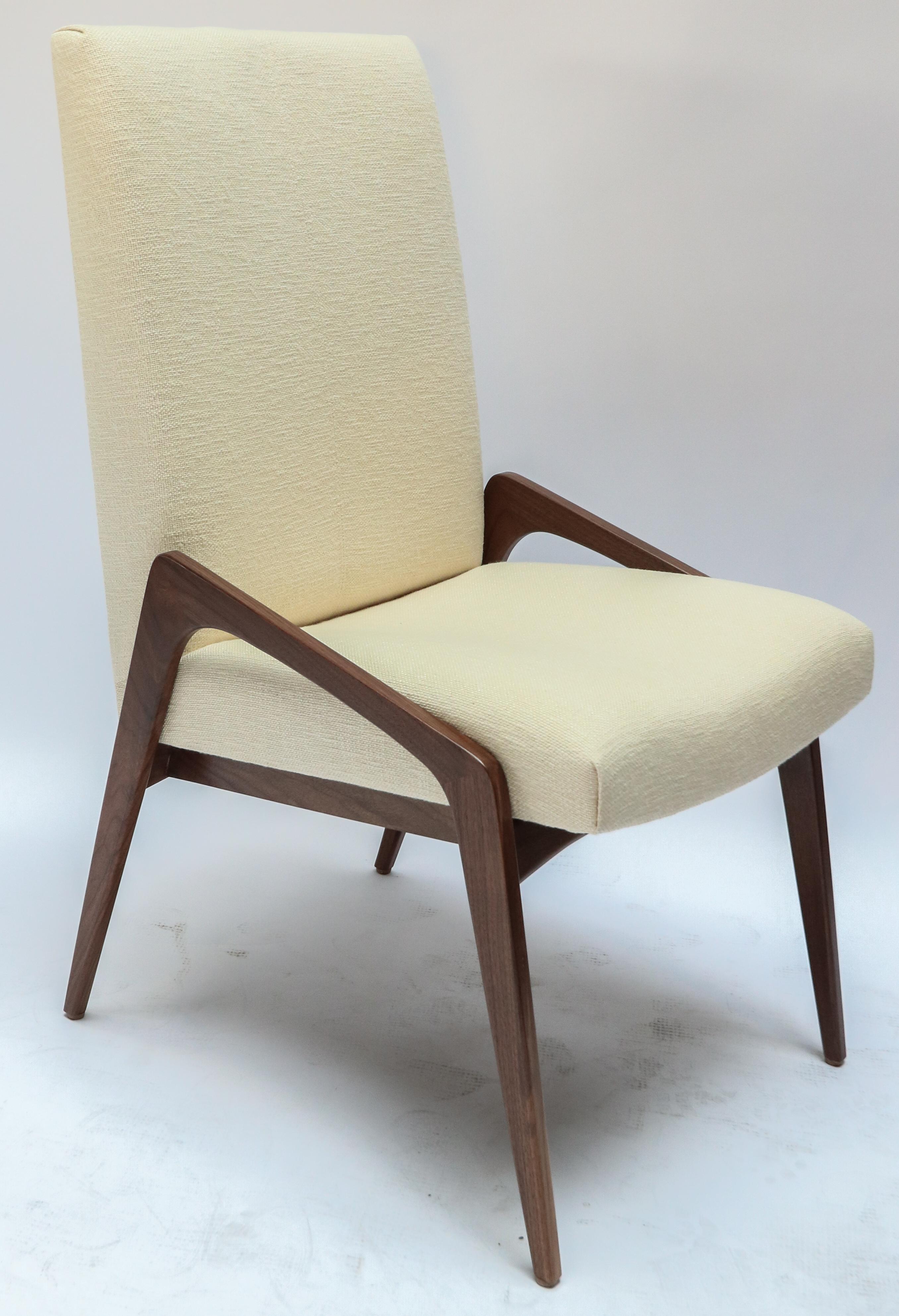 Set of 10 custom midcentury style dining chairs in American walnut and ivory linen. Made in Los Angeles by Adesso Imports. Can be done in different woods and fabrics.