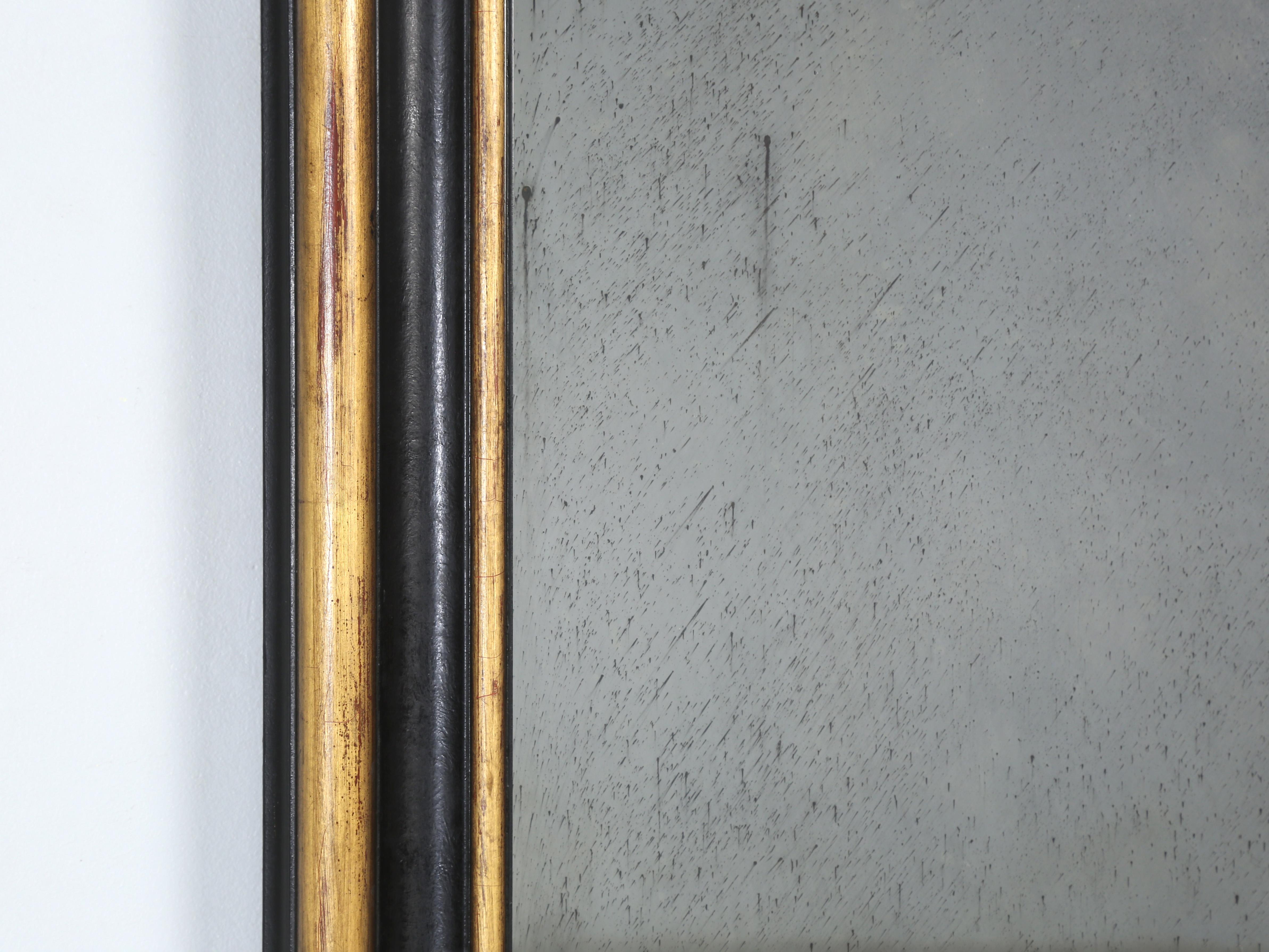 Custom Mirror Hand-Made in our Workshop Using 24kt Gold Leaf and Ebonized Oak In Good Condition For Sale In Chicago, IL