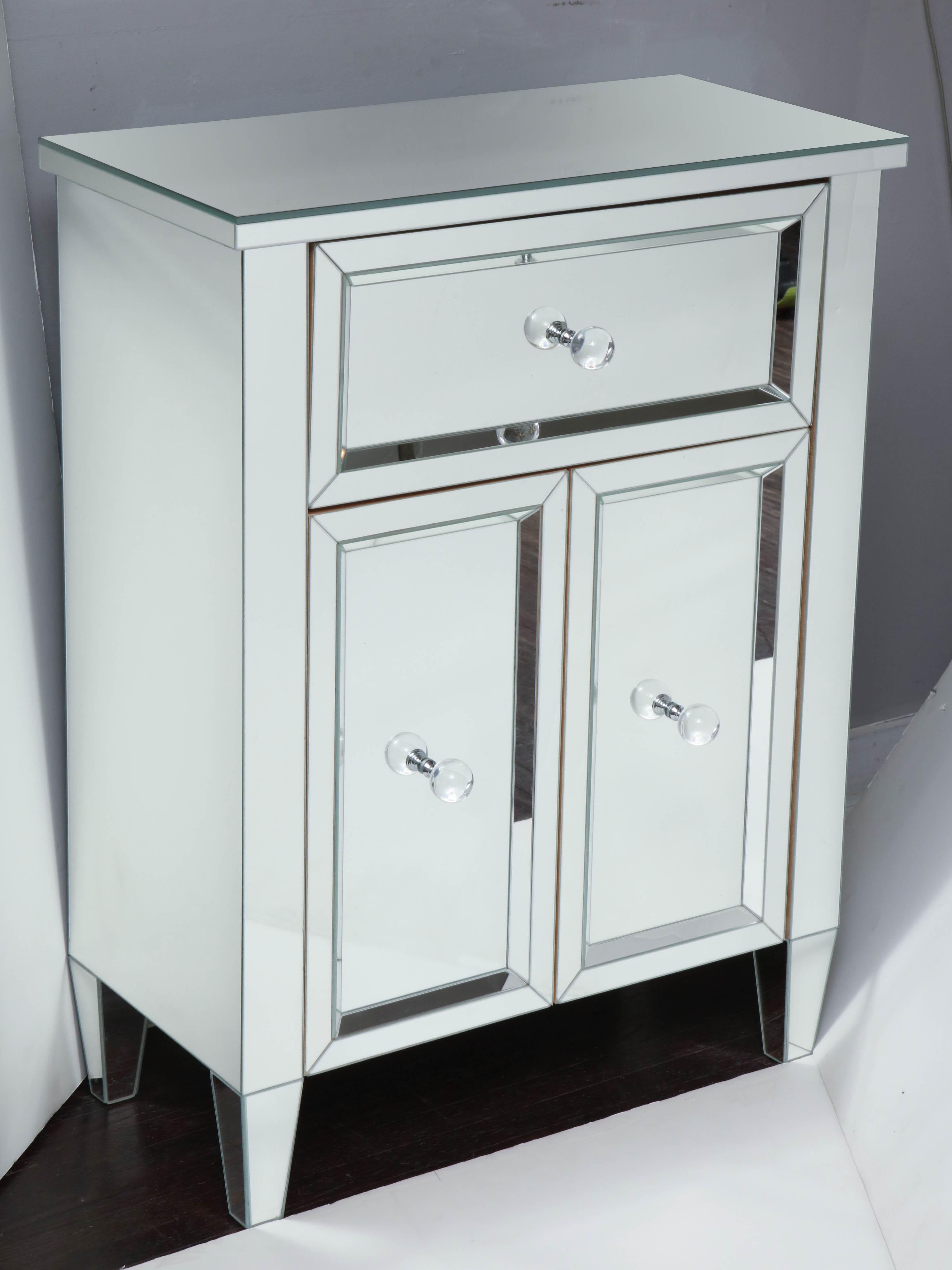 Custom 2-door mirrored nightstand with single drawer. Customization is available in different sizes. hardware and mirror finishes.