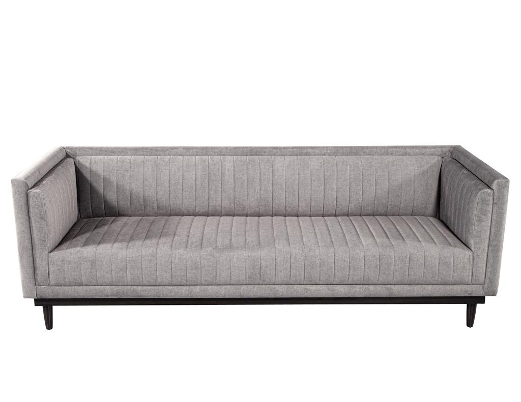 Hand crafted in Canada with the utmost attention to detail and quality, this sofa is a true testament to modern design and functionality. The sleek and minimalistic styling of this sofa is sure to make a statement in any living space. The channeled