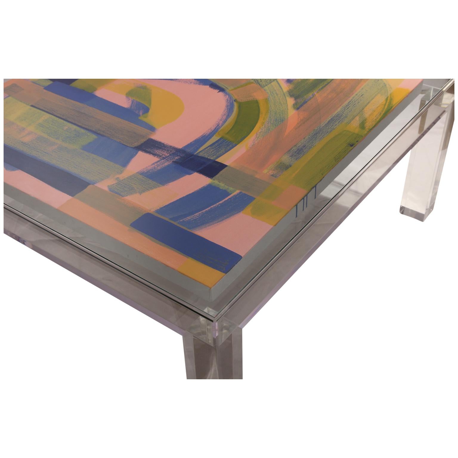 Custom made Lucite coffee table or center table with a removeable glass top. The inside of the table allows for displaying art or other desired objects.
Inside table dimensions: H 39 in x W 39 in x D 2.5 in.