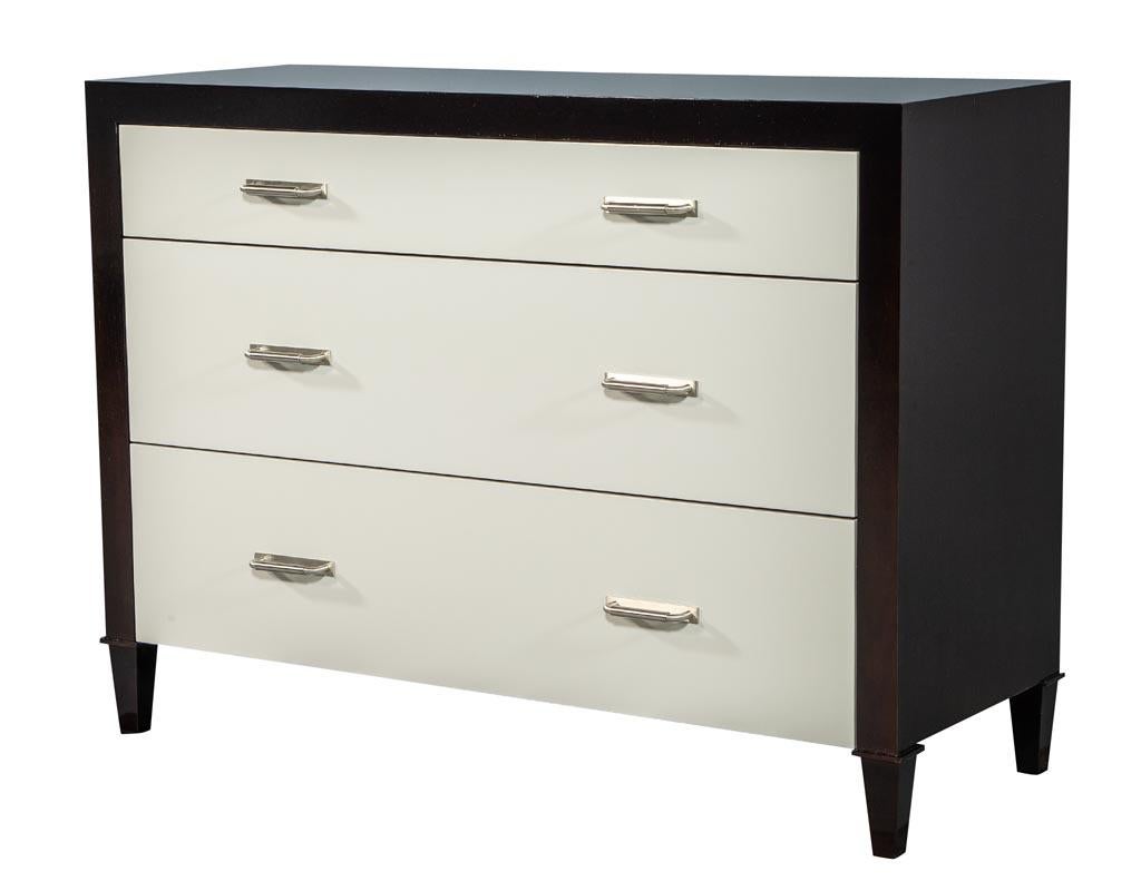 Custom modern nightstand chest of drawers by Carrocel. Sporting Modern Clean Lines, these chests have a smooth cream lacquer finish on the drawer faces surrounded by a rich walnut exterior cover finished in a hand polished lustrous walnut.

This