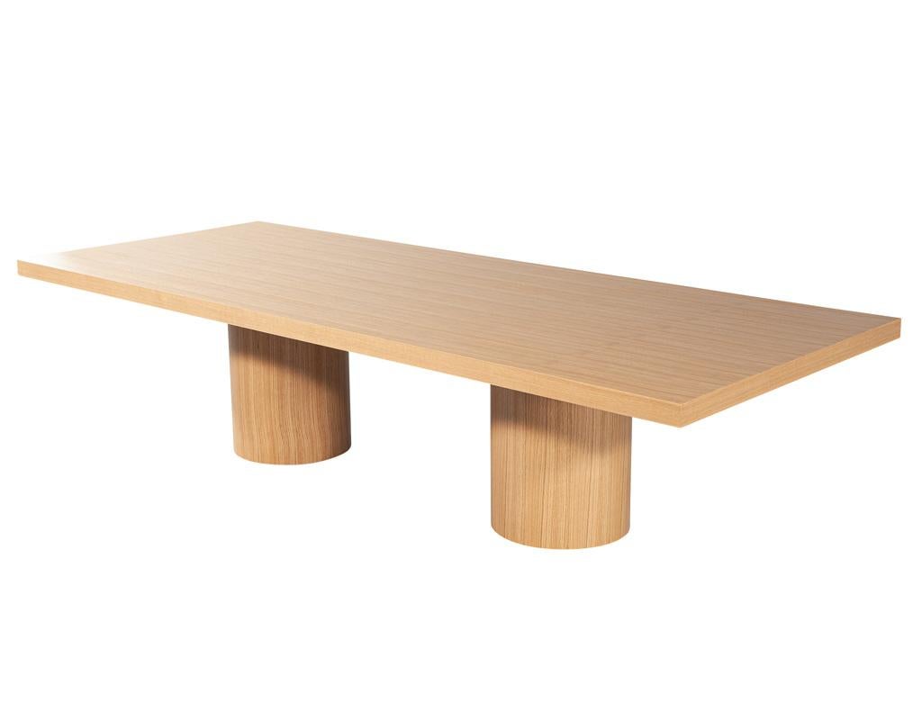 Introducing our Custom Modern Oak Dining Table, a stunning centerpiece crafted by the skilled artisans at Carrocel right here in Canada. Made from premium oak wood, this table showcases a beautiful natural finish that highlights the unique grain
