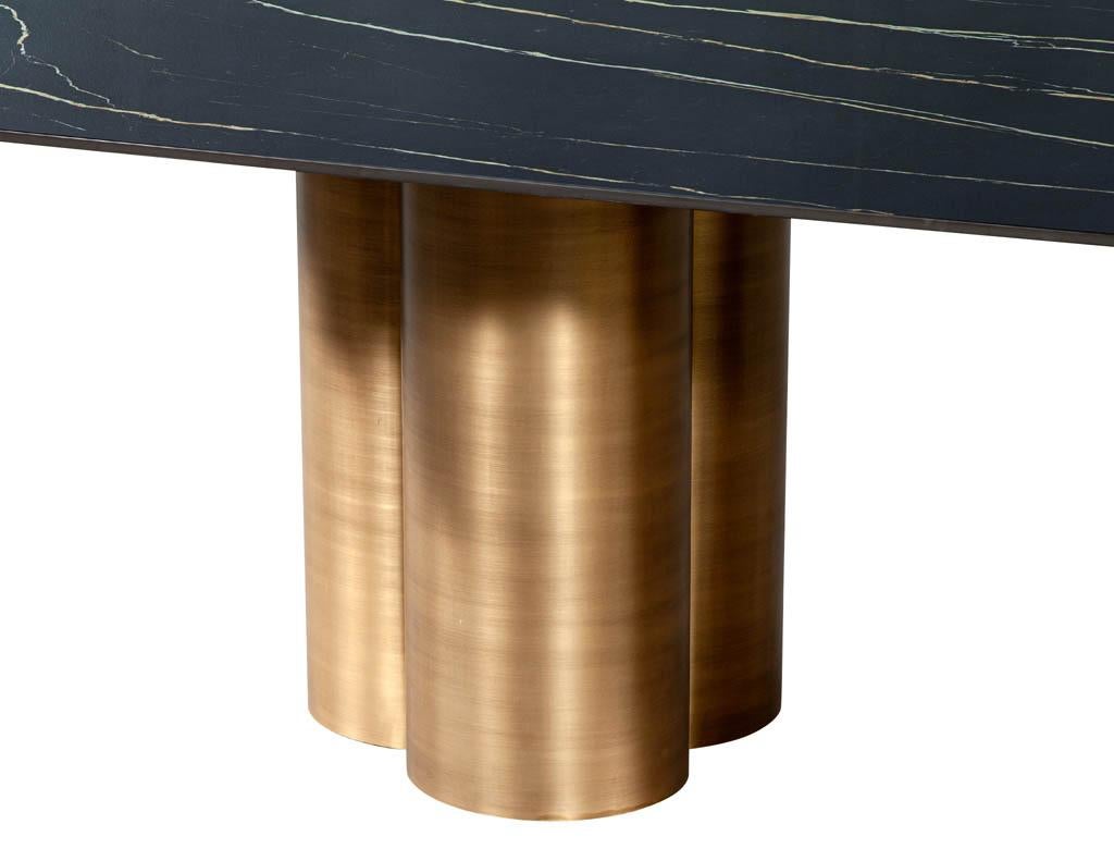 Italian Custom Modern Porcelain Dining Table with Antiqued Brass Clover Pedestals For Sale