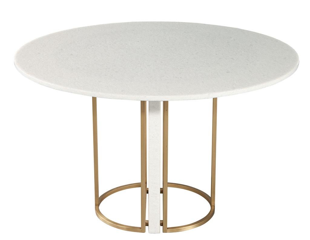 Custom Modern Round Marble Top Dining Table with Brass. This stunning custom modern round marble top dining table is sure to be the focal point of any dining space. With a large geometric marble slab surrounded by a sleek brass base provides ample