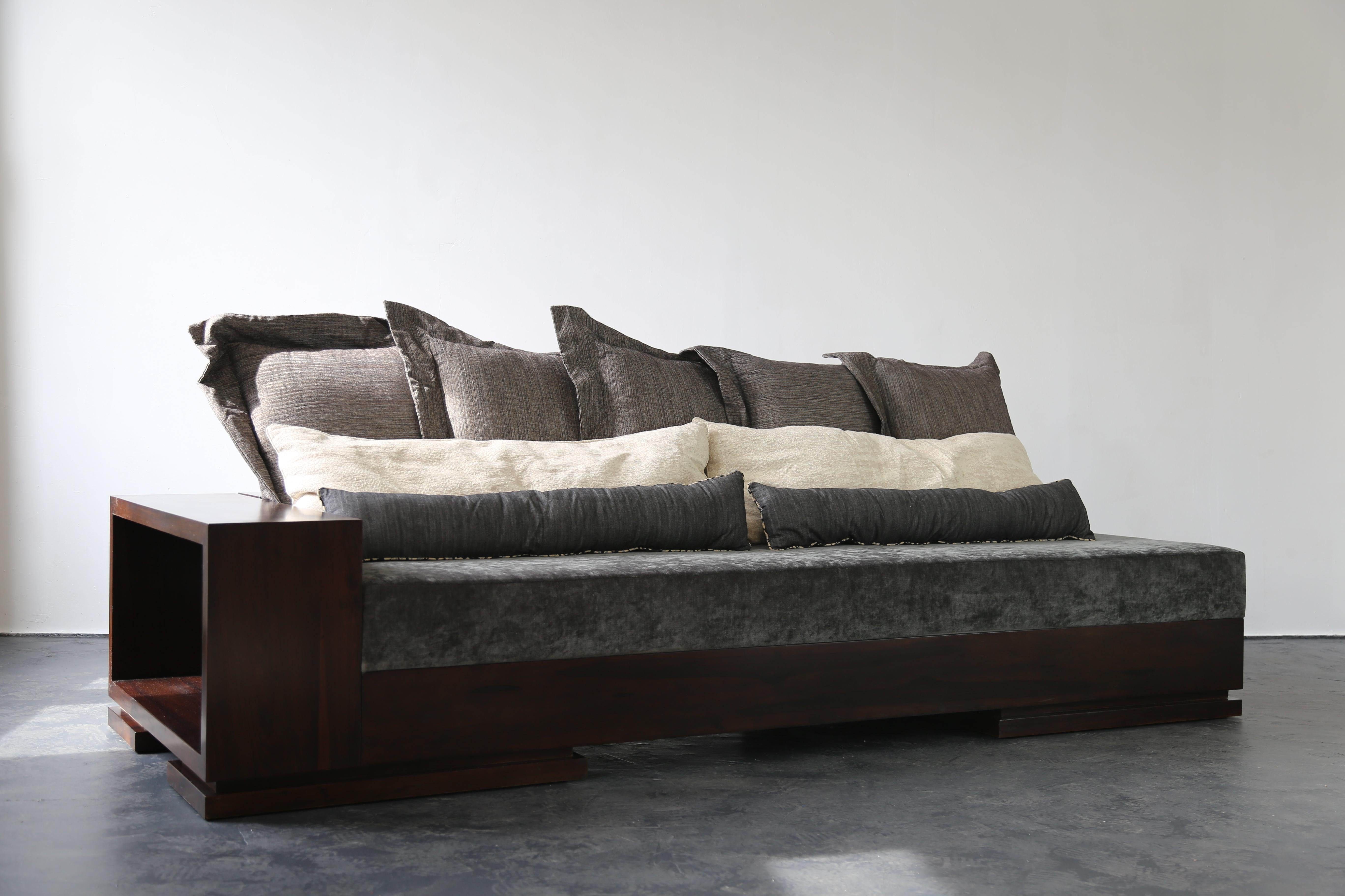 The Patone Sofa balances a modern design with natural materials and can be made in any size with any upholstery material.  Shown here in several versions, it can be specified with several different pillow combinations, as well as different arm and