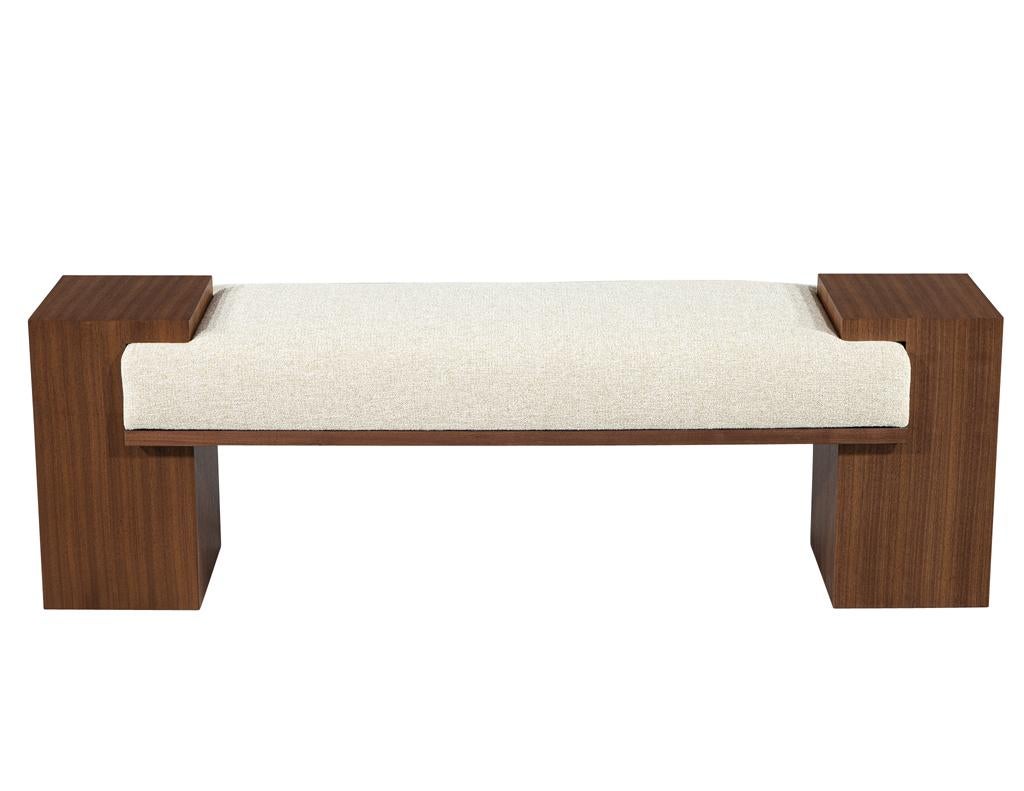 Introducing the Carrocel Custom Modern Walnut Bench, a stunning fusion of modern and contemporary design. Hand-crafted from exquisite walnut, this bench showcases beautiful wood grains that add warmth and sophistication to any space. Its satin