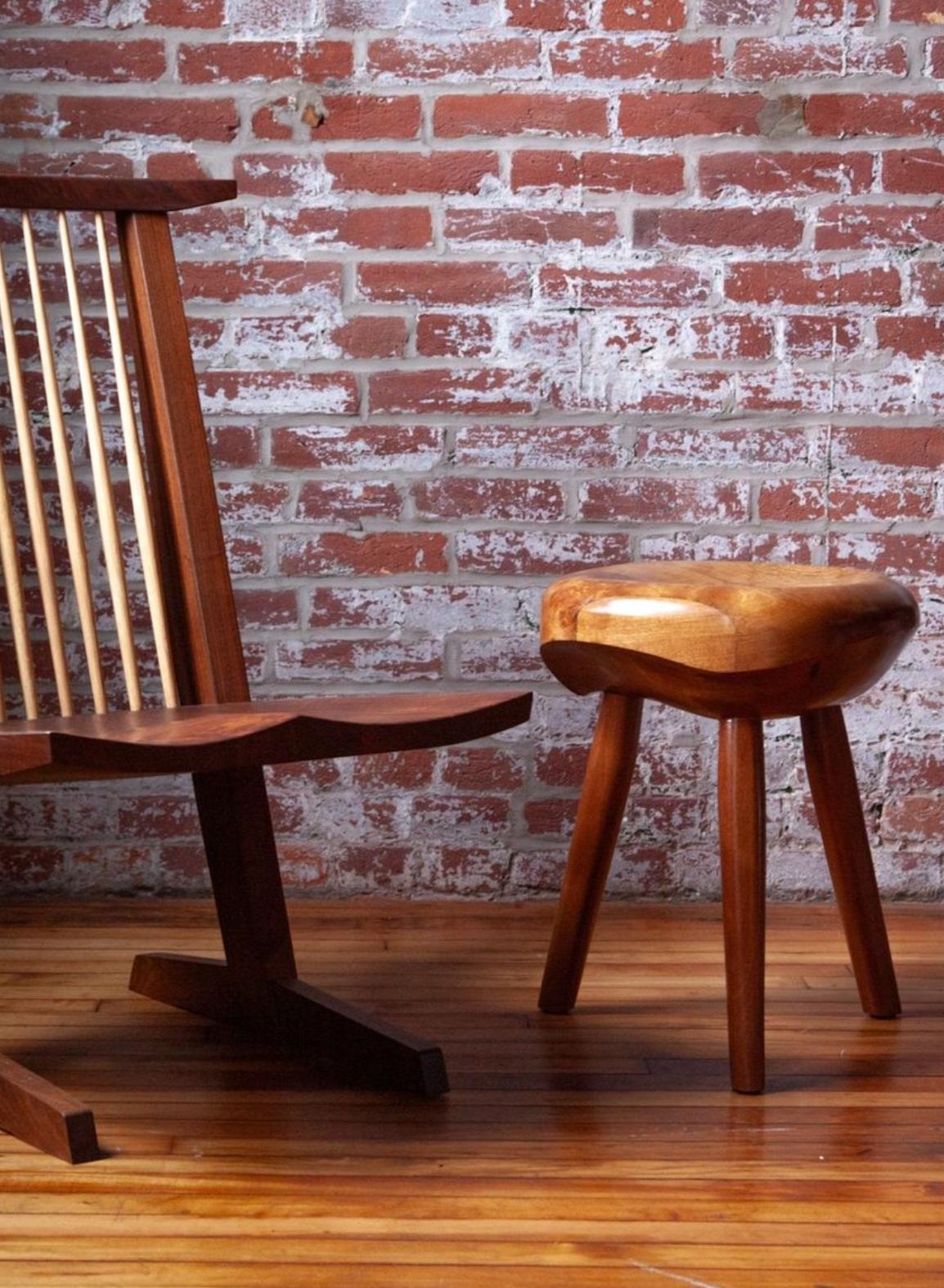 Expertly crafted contemporary modernist stool. Drawing inspiration from early 20th century French design and cubism, these exquisite stools feature sculptural curves resulting in a truly unique form. Slightly concave seat is present for comfort but