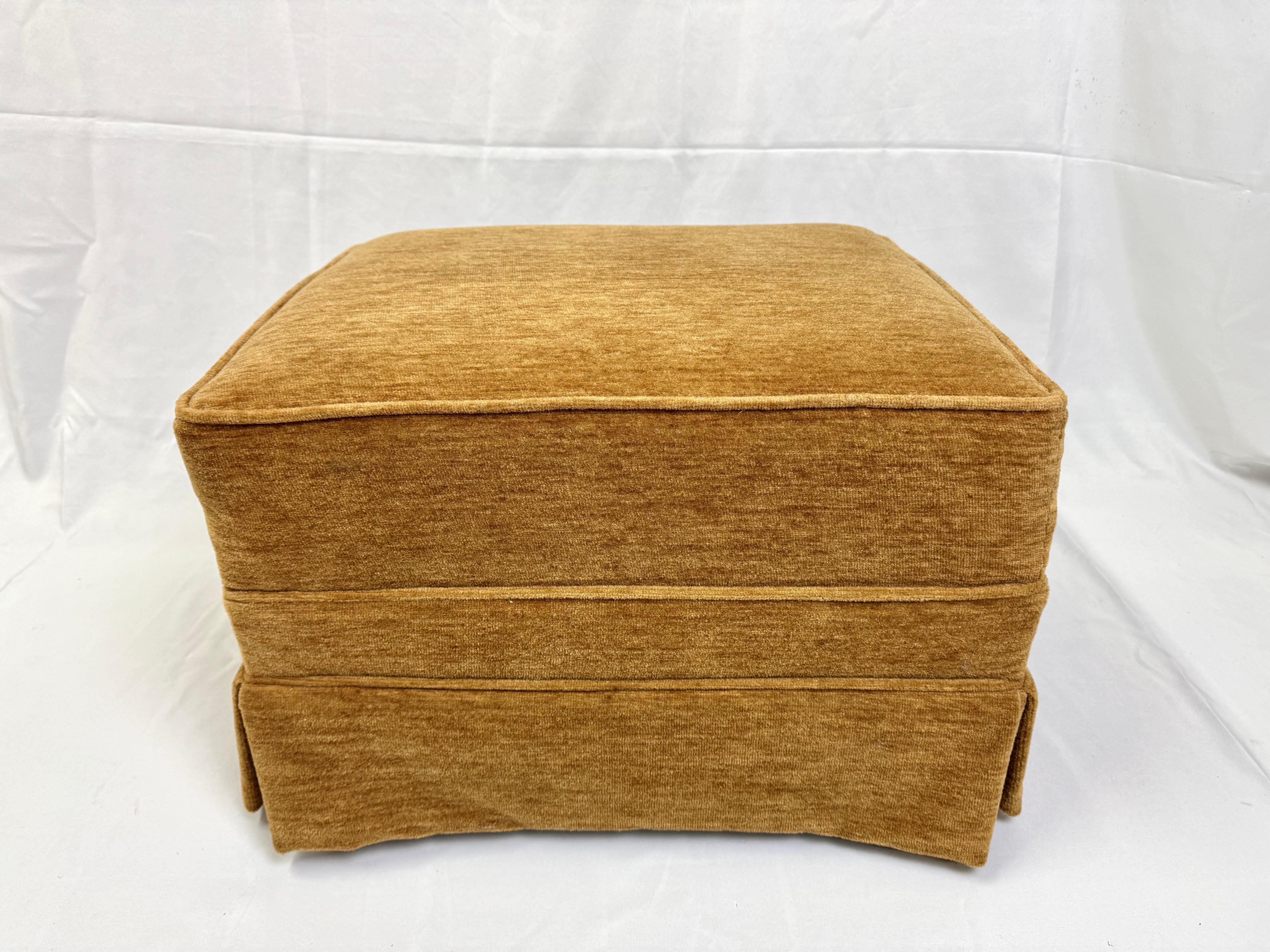 Custom Mohair Velvet Ottoman. In a golden maple syrup color. Use as a footrest or as a small coffee table. Rests on four mahogany wooden feet.