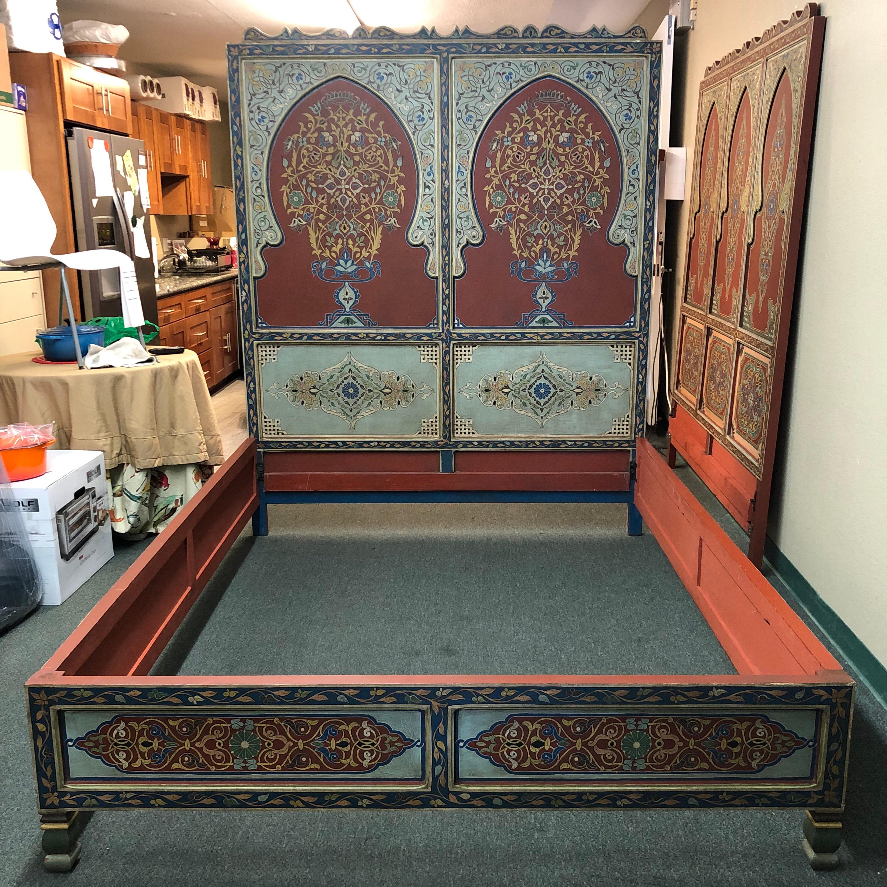 Stunning custom bedroom set, handcrafted in Morocco. Referencing traditional carved elements and rich colors of the country, the queen bed frame and pair of nightstands are an exotic delight that transports one to another time and place. A pair of