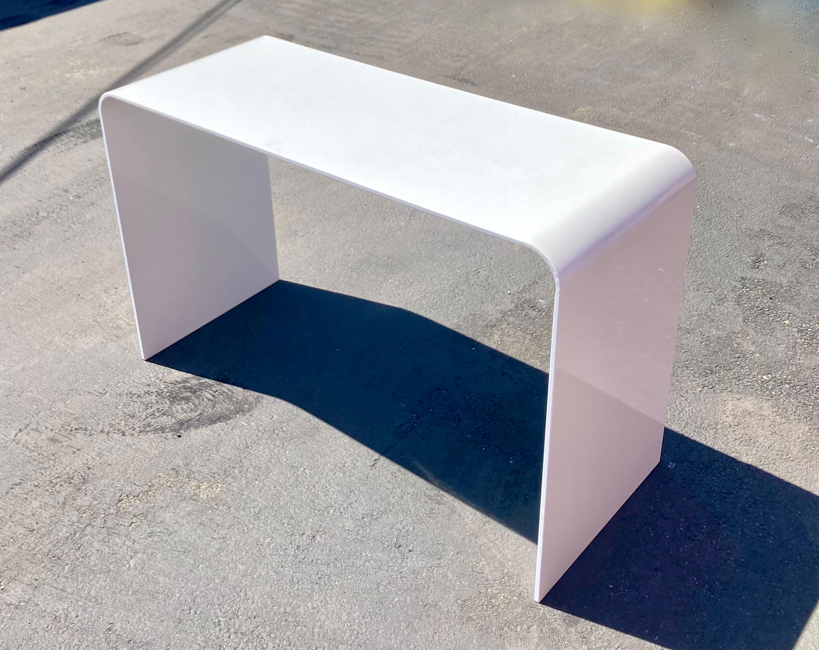 Custom made steel console table with waterfall edges, mcm inspired. Excellent choice in an entryway, hallway, or for a computer desk or console table. Features clean gloss white powder coat.

In excellent condition as pictured.

Dimensions: 47