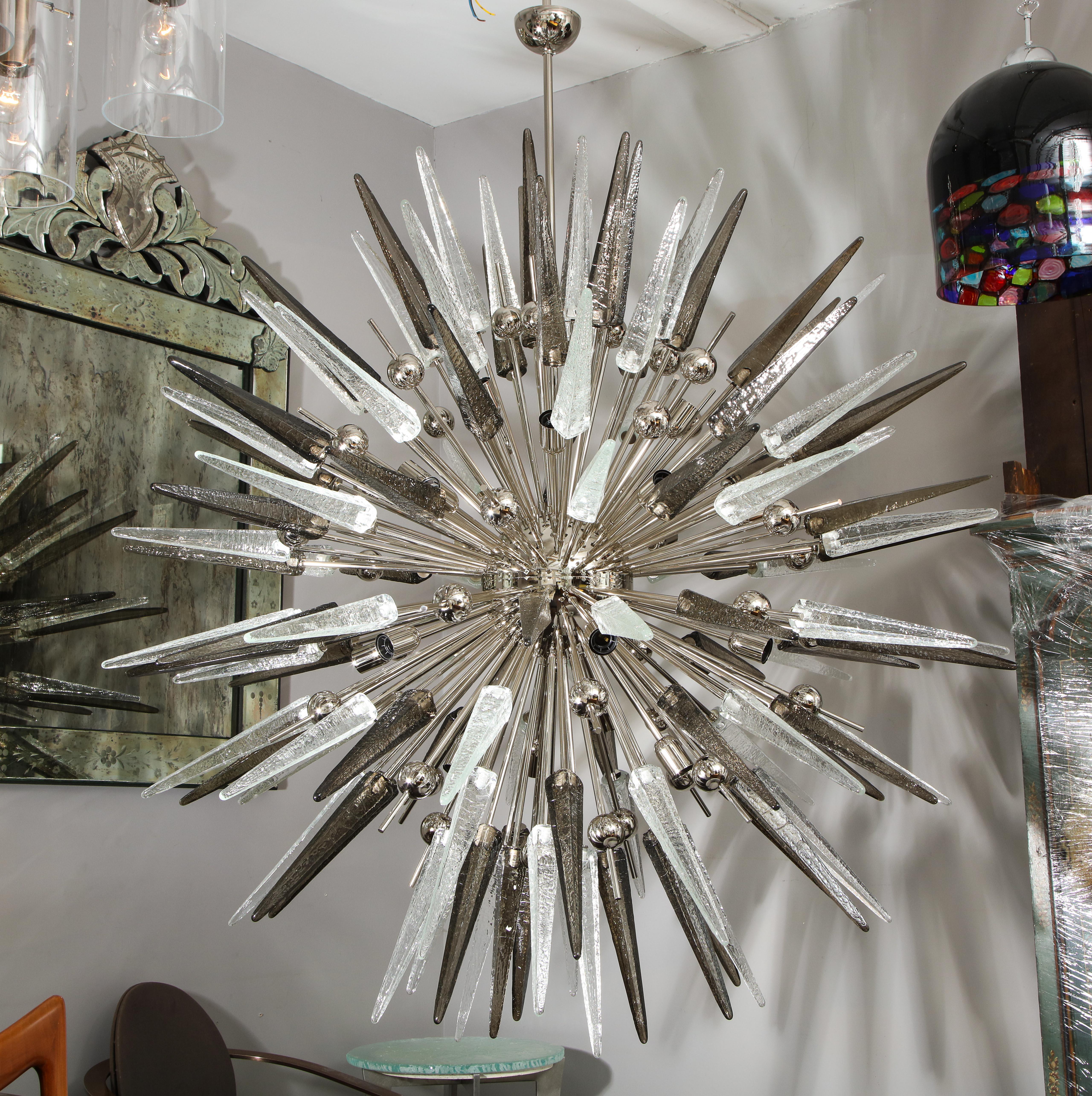Custom clear and smoke Murano glass spike Sputnik chandelier with metal spheres. Customization is available in different sizes, finishes, and glass color combinations. 