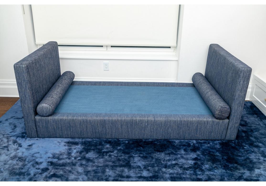 A Stylish minimally designed Custom Daybed upholstered in a sophisticated Navy Linen type fabric. The Daybed has an airy and open presentation and has many possible design applications, Living Room, Bed Room or Studio. The Bed has two Bolster
