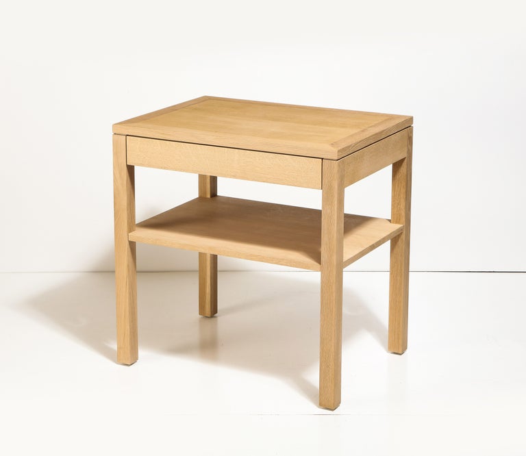 Custom Oak Bedside Table by Robert Stilin with Single Drawer. 

This handsome bedside table consists of a solid oak construction, rectangular legs, single drawer, and one level of open shelving. 

Standard dimensions are listed above but custom