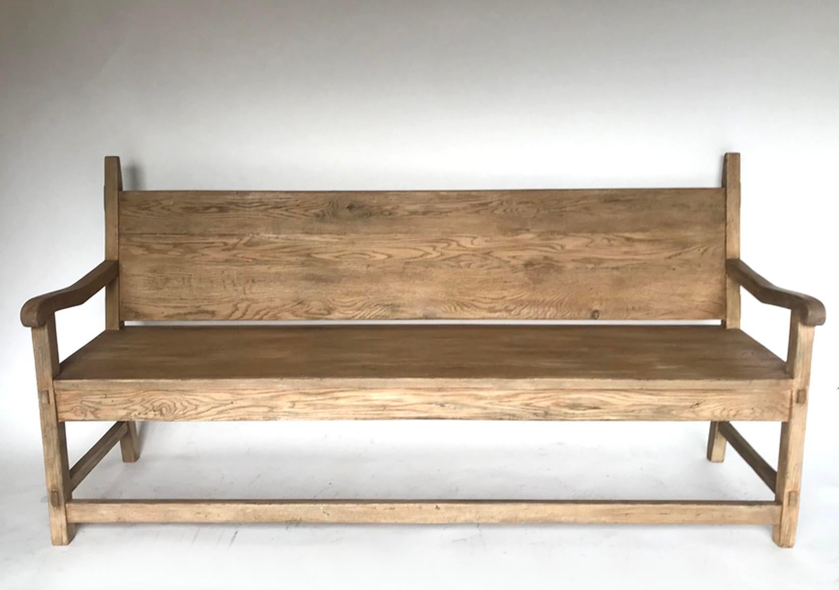 This is one of our custom benches that can be made in walnut or oak. As shown in oak with a distressed natural, weathered looking finish. This can be made in custom lengths and it can also be made deeper to be used as a daybed. This particular one