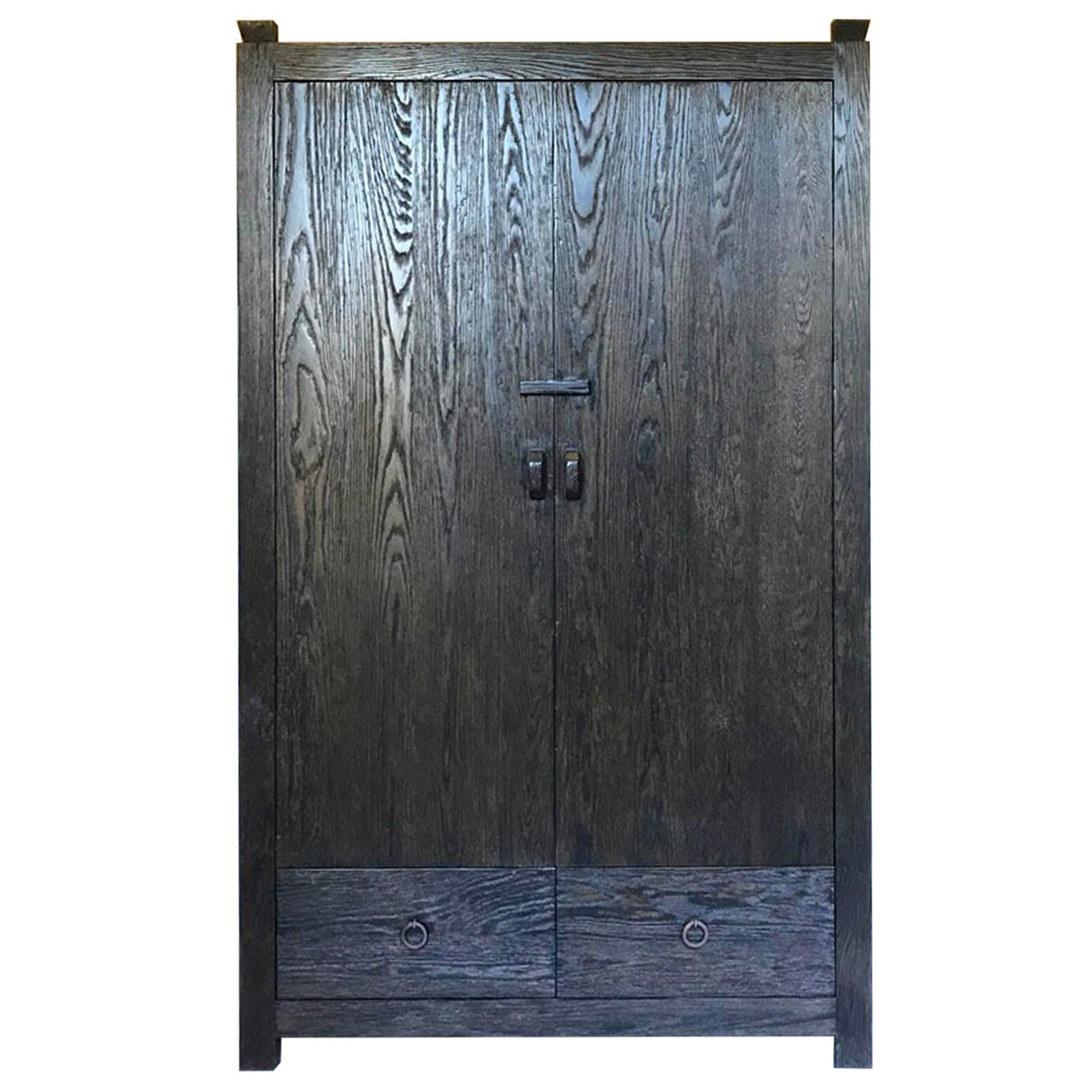 Custom Oak Cabinet with Pocket Doors by Dos Gallos