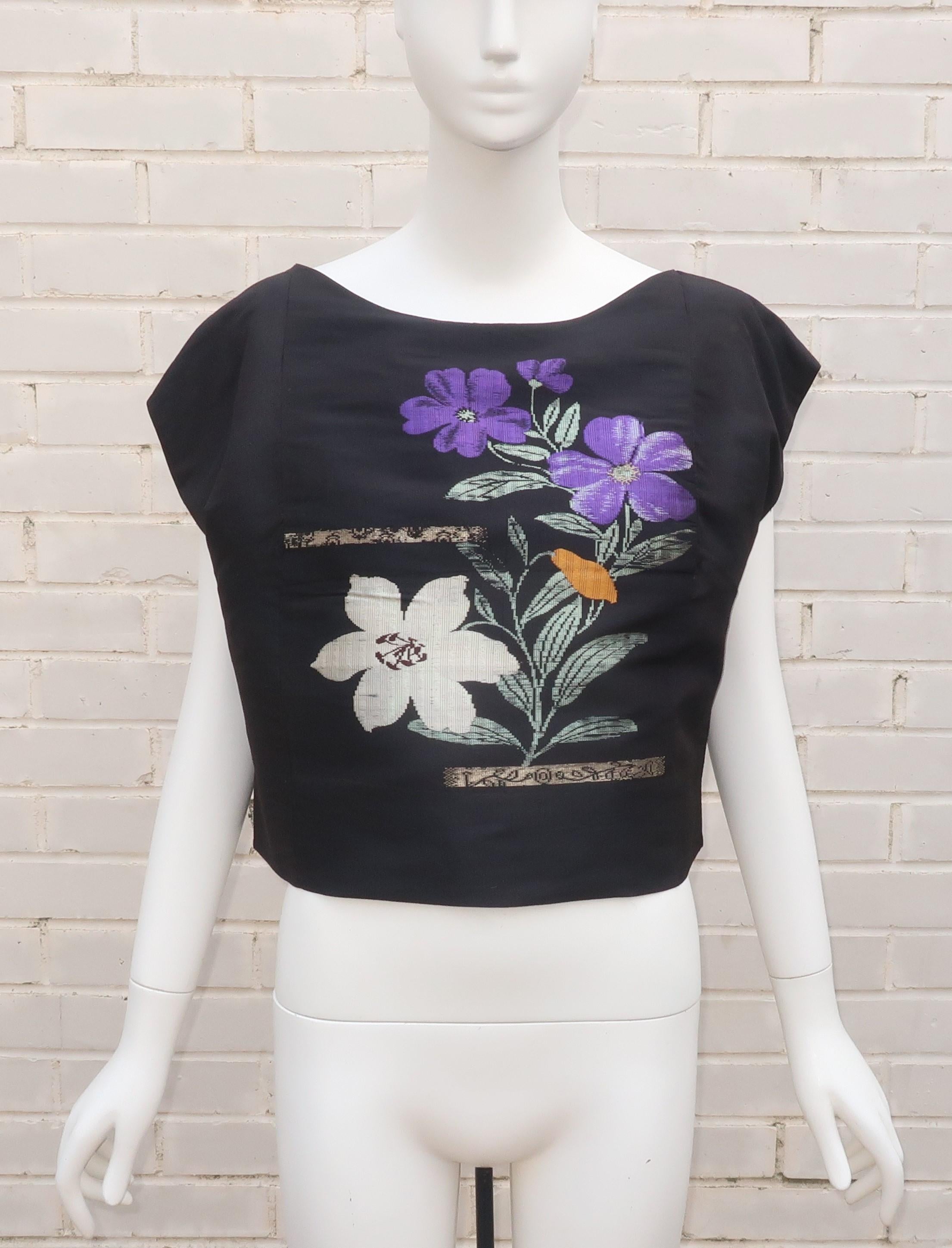 C.1950 cap sleeve black shell style top custom fabricated from a Japanese obi cloth.  The black background is the perfect frame for the rich royal purple, green and matte silver floral design.  The top is simply made with pullover construction and a