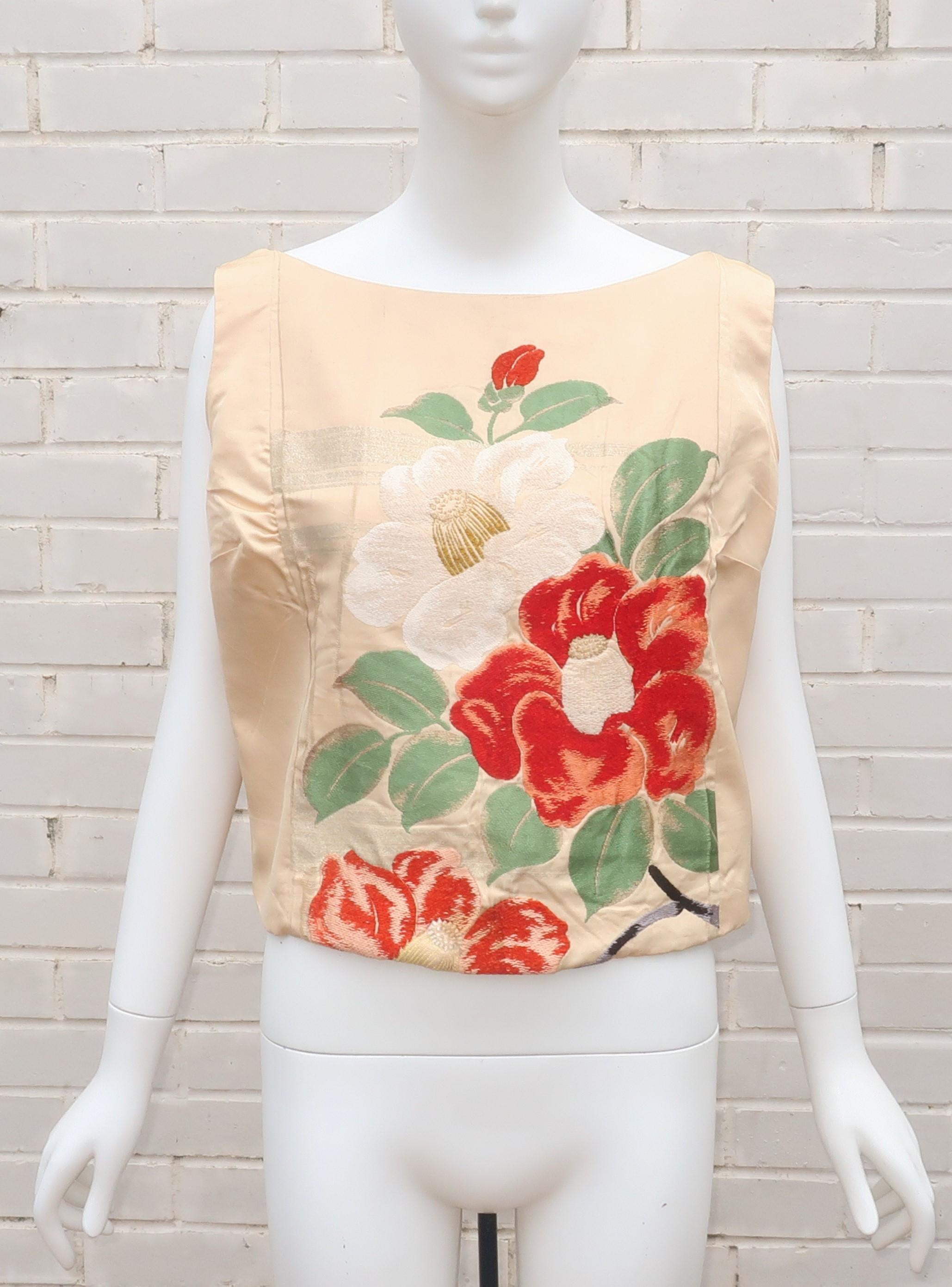 C.1950 sleeveless creme shell style top custom fabricated from a Japanese obi cloth.  The rich creme background is the perfect frame for the vibrant coral red, antique white and green flower design which has a chenille texture all accented by silver