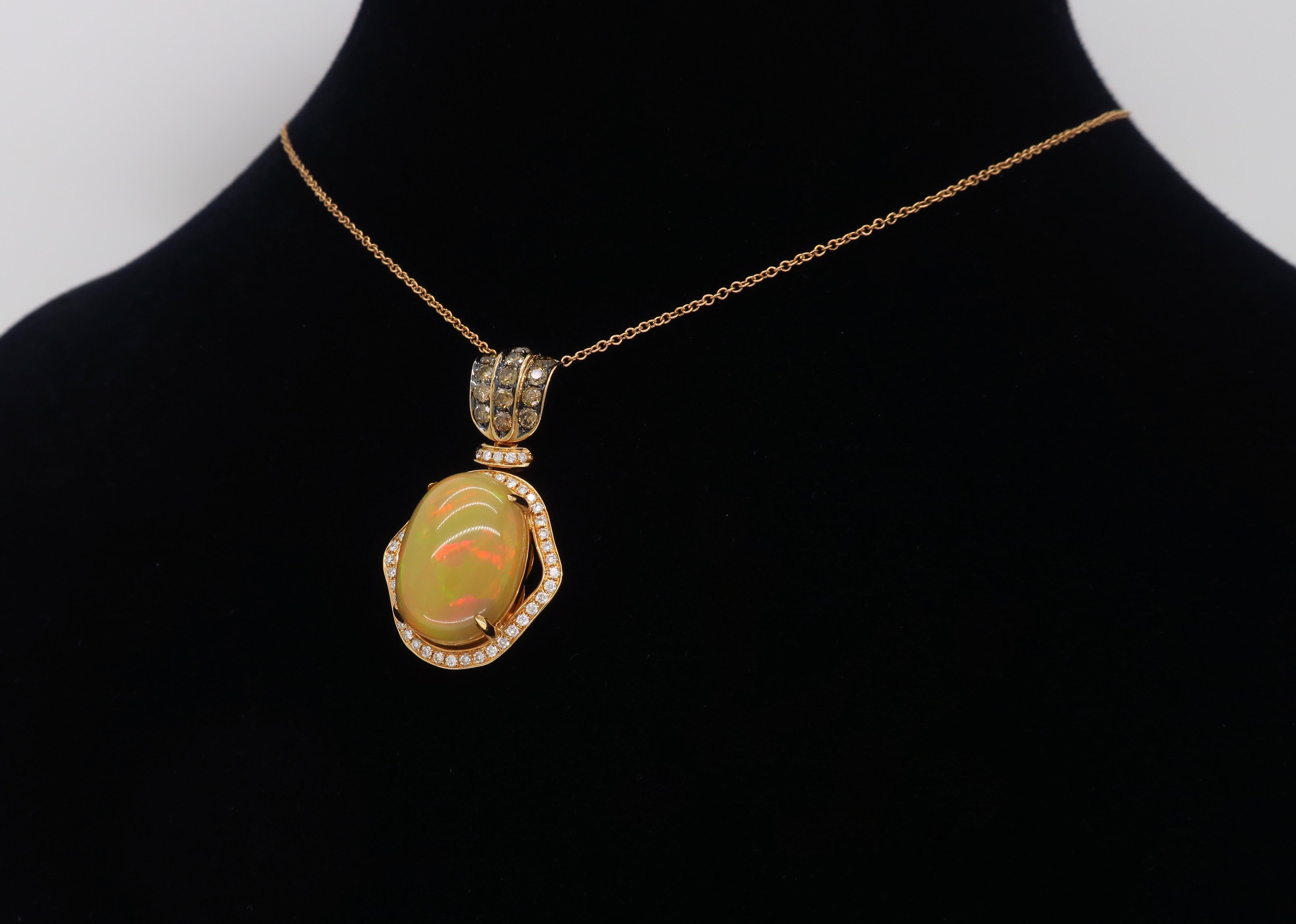 Custom Le Vian Opal and Diamond Pendant crafted in 18k gold. 

Designer: Le Vian
Gemstone: Neopolitan Opal 
Gemstone Weight: Approximately 5.89CT
Diamond Carat Weight: Approximately .75CTW
Diamond Cut: Round Brilliant; Average G-J Color and 13 Brown