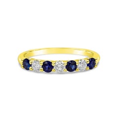 Custom Order: Blue Sapphire and Diamond Seven-Stone Wedding Band