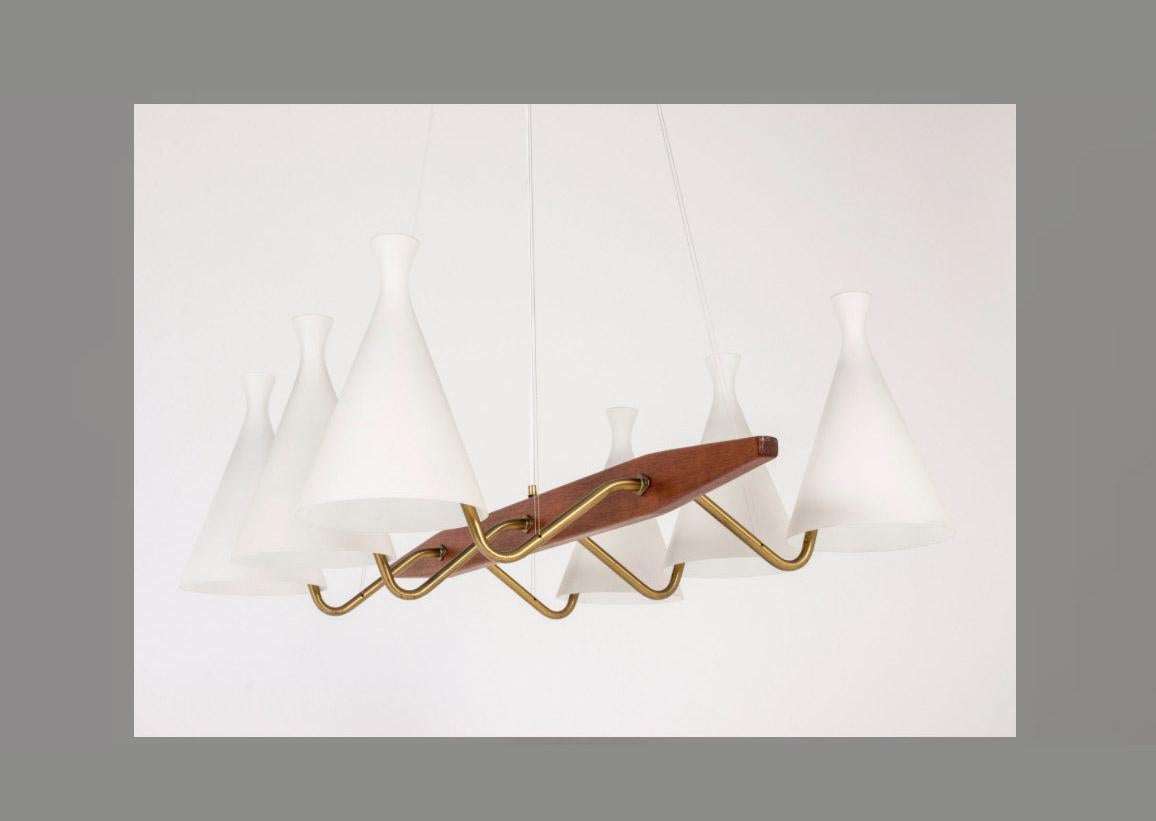 Set of three opaline glass lamp shades.