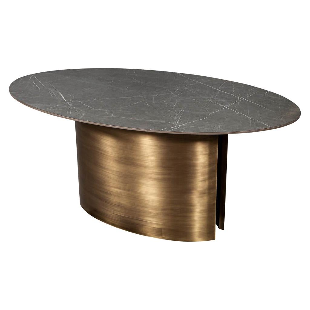 Custom Oval Porcelain Top Dining Table with Brass Demi Lune Base by Carrocel