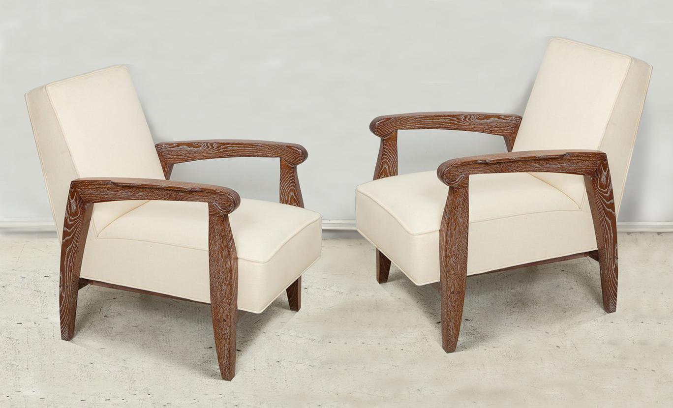 Custom pair of cerused oak lounge chairs in the French 1940s manner.
Dimensions:   total Arm W 25