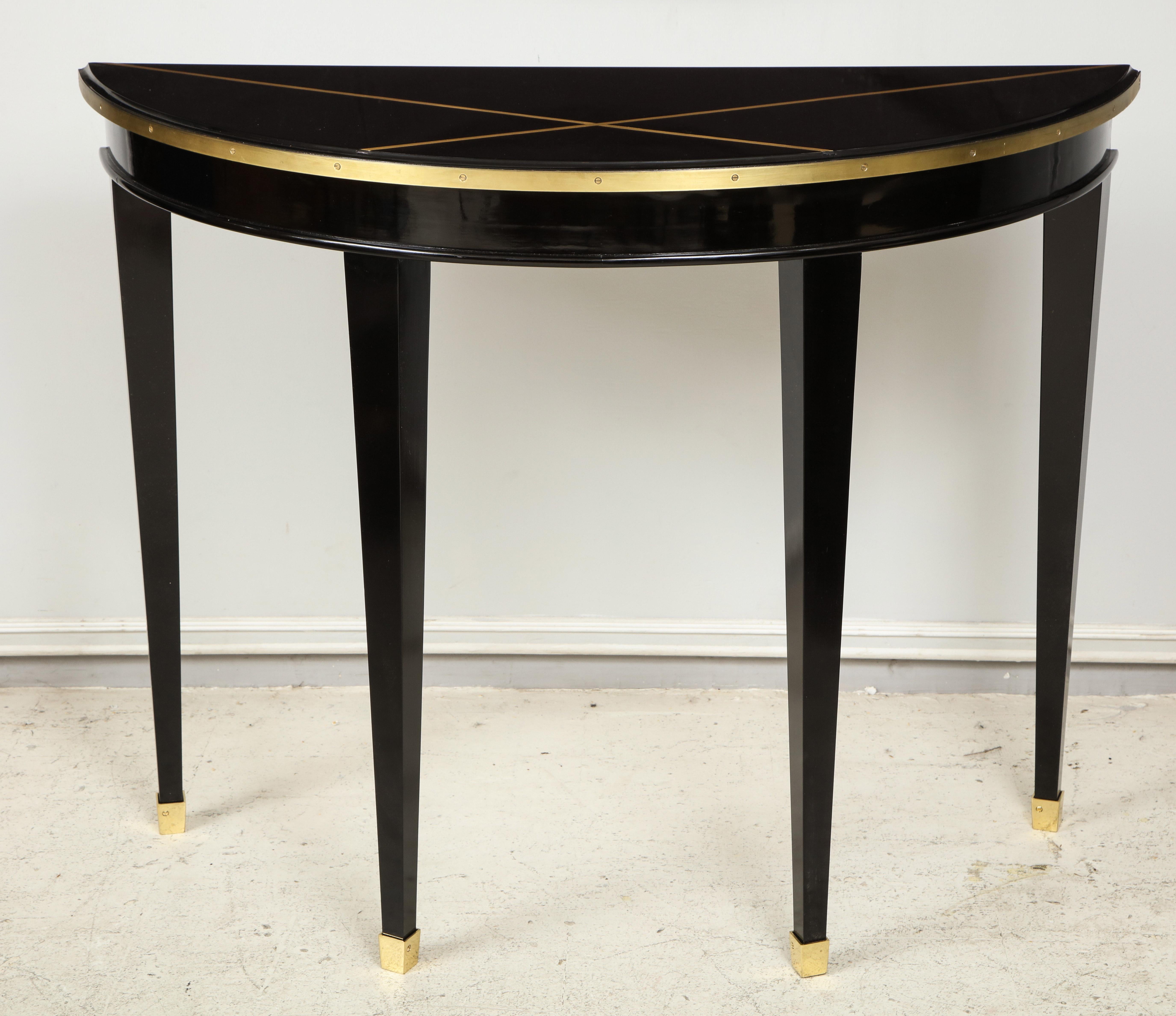 American Custom Pair of Ebonized Demilune Consoles with Inlaid Brass Top For Sale