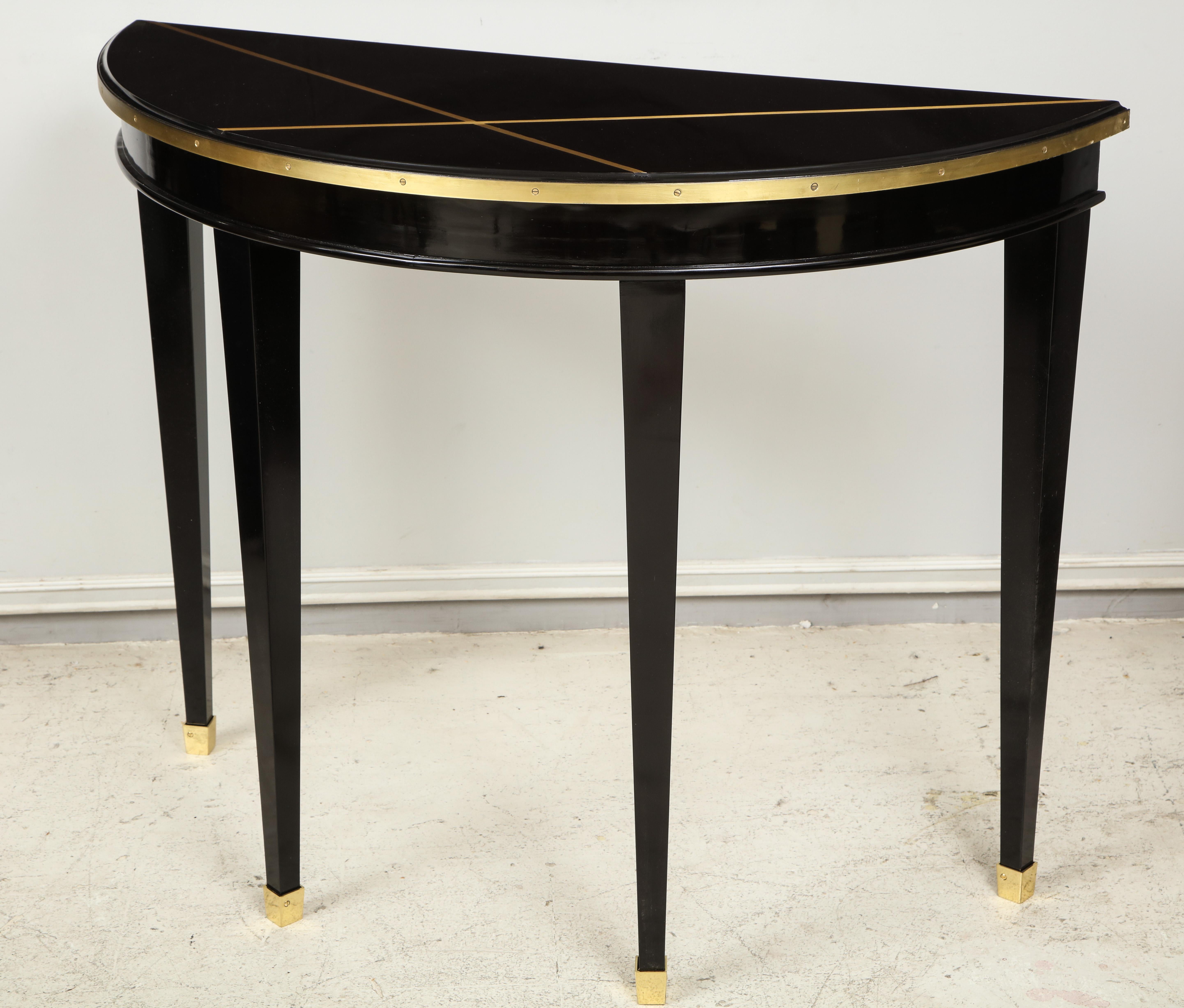 Mahogany Custom Pair of Ebonized Demilune Consoles with Inlaid Brass Top For Sale